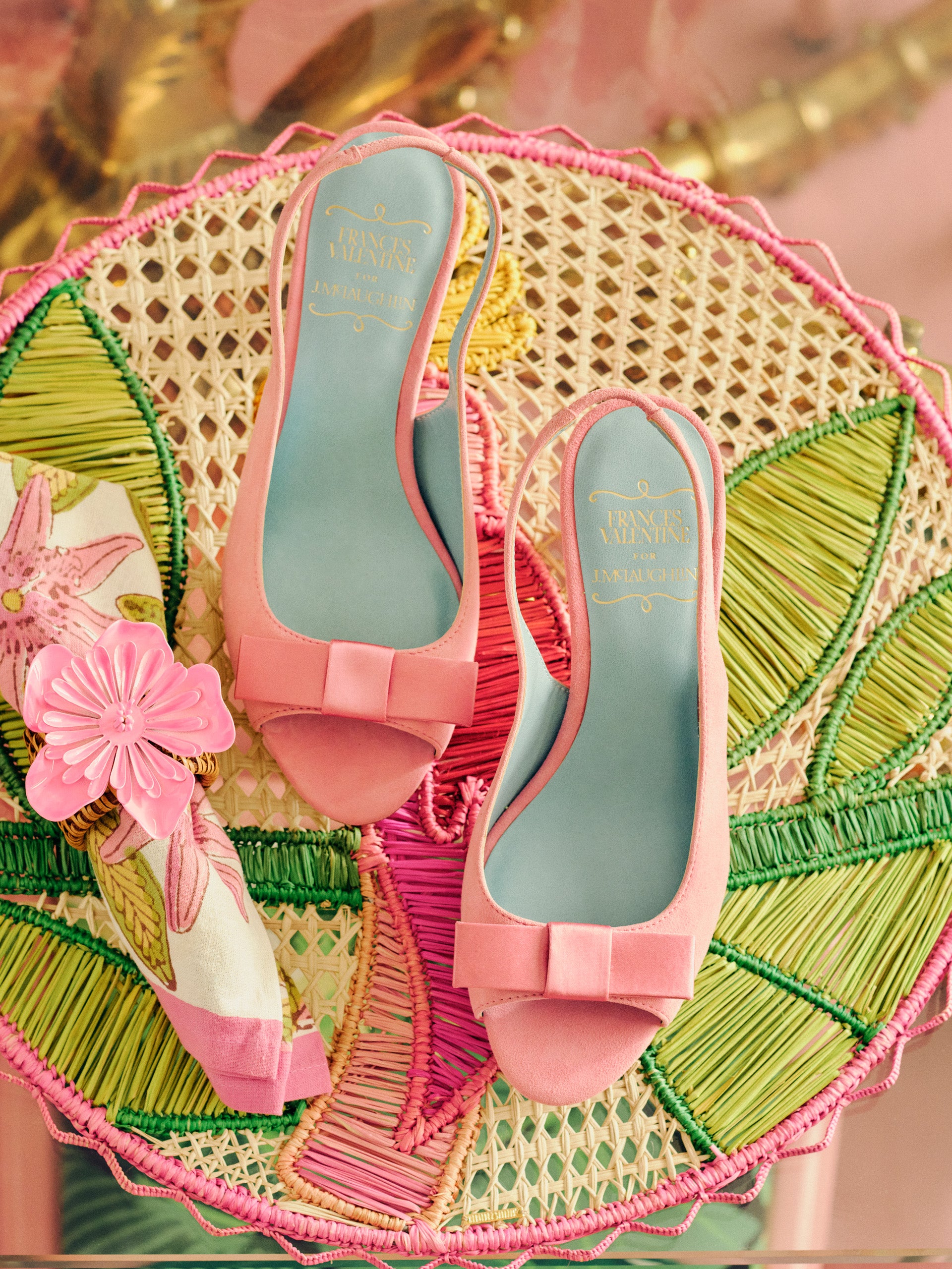 Reese Suede Slingbacks by J.McLaughlin showcase effortlessly stylish design in soft pink suede with a charming bow accent, blending enduring elegance with timeless craftsmanship.