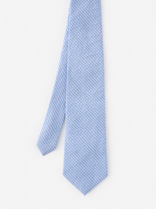 Cotton Seersucker Tie in Stripe by J.McLaughlin in light blue with subtle white stripes, effortlessly stylish accessory reflecting enduring designs and a legacy of timeless fashion.