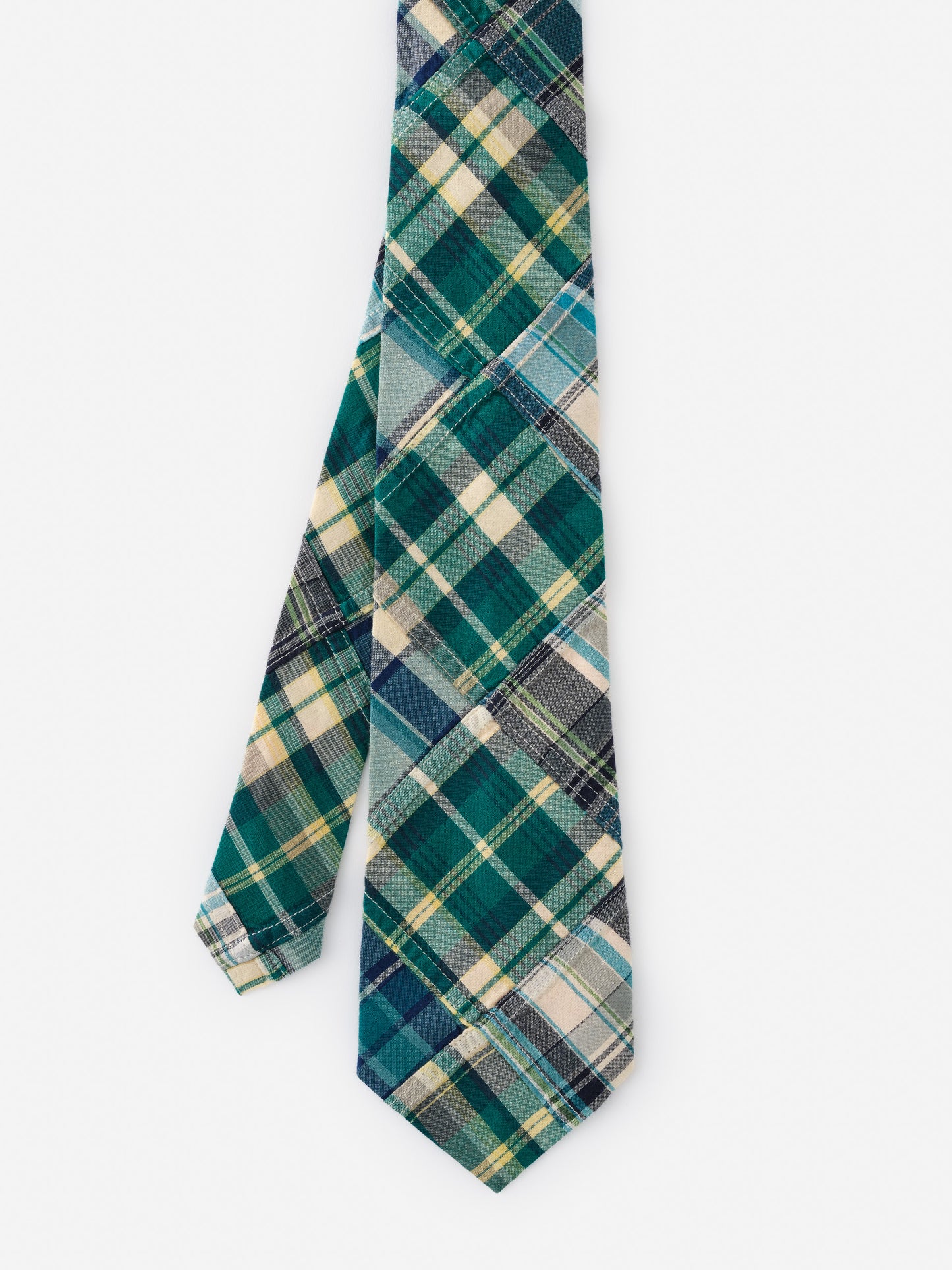 Cotton Tie in Plaid by J.McLaughlin showcasing a classic plaid pattern in green, blue, cream tones, blending effortlessly stylish, enduring designs with a legacy of timeless fashion.