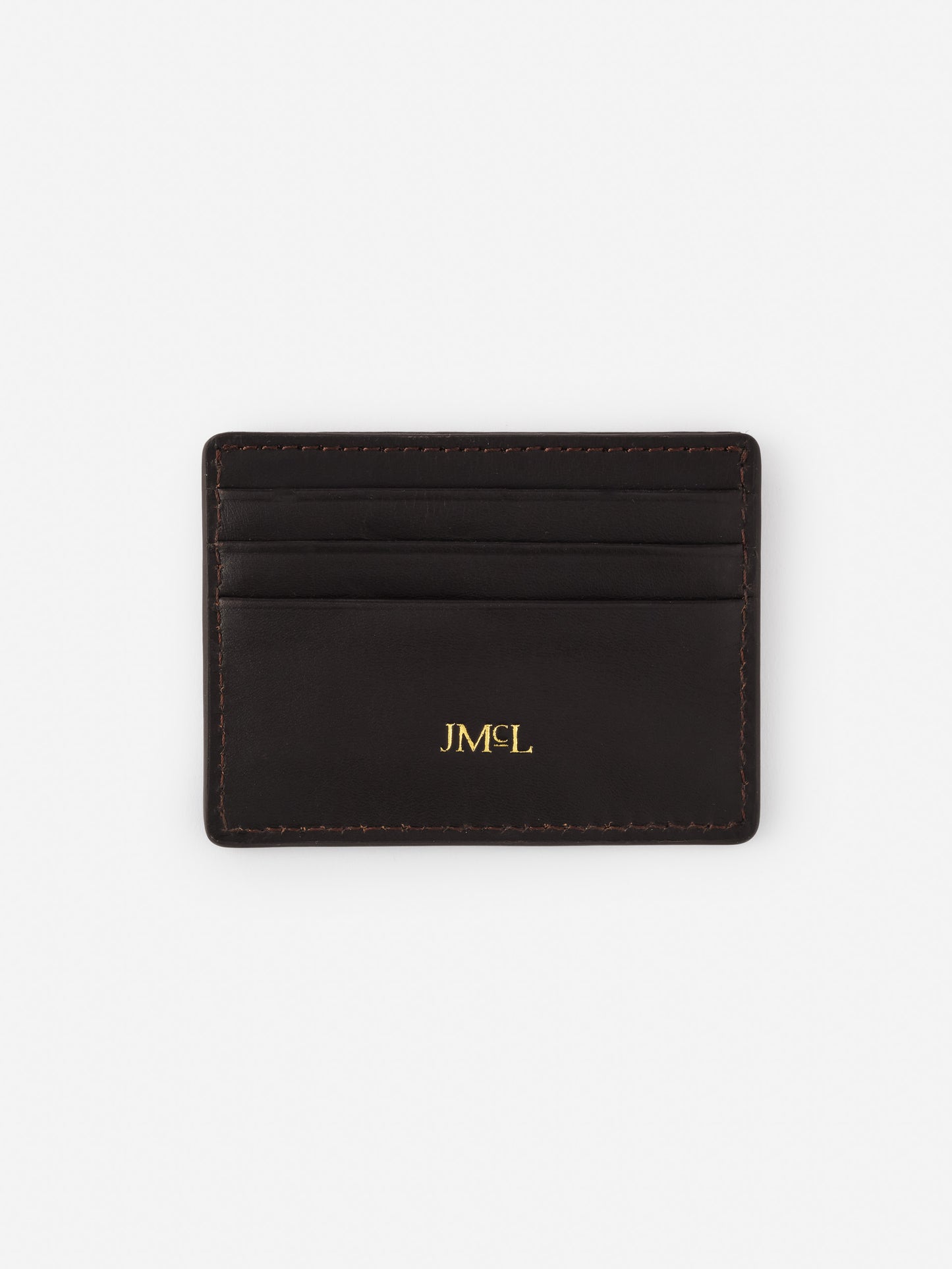 Needlepoint Cardcase in Nautical Flag by J.McLaughlin, a sleek black leather cardholder featuring gold monogram detailing, reflecting effortlessly stylish, enduring designs.