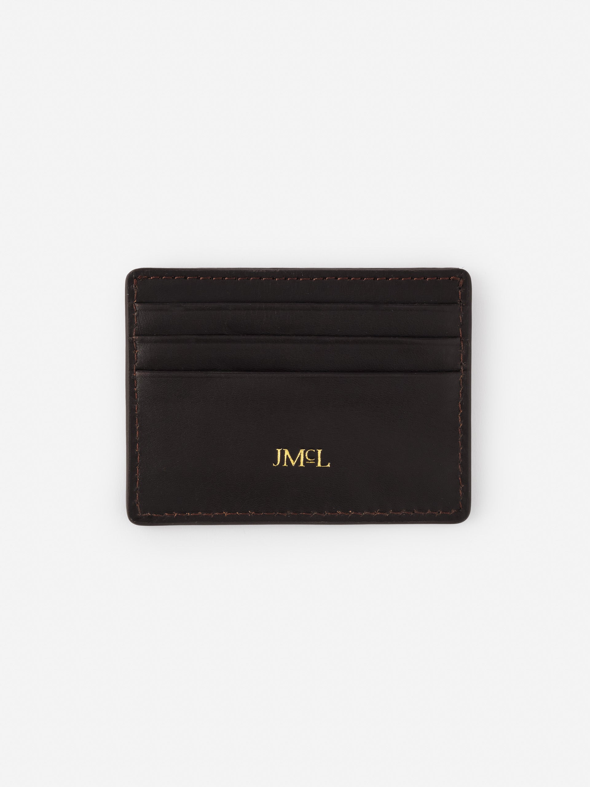 Needlepoint Cardcase in Nautical Flag by J.McLaughlin, a sleek black leather cardholder featuring gold monogram detailing, reflecting effortlessly stylish, enduring designs.