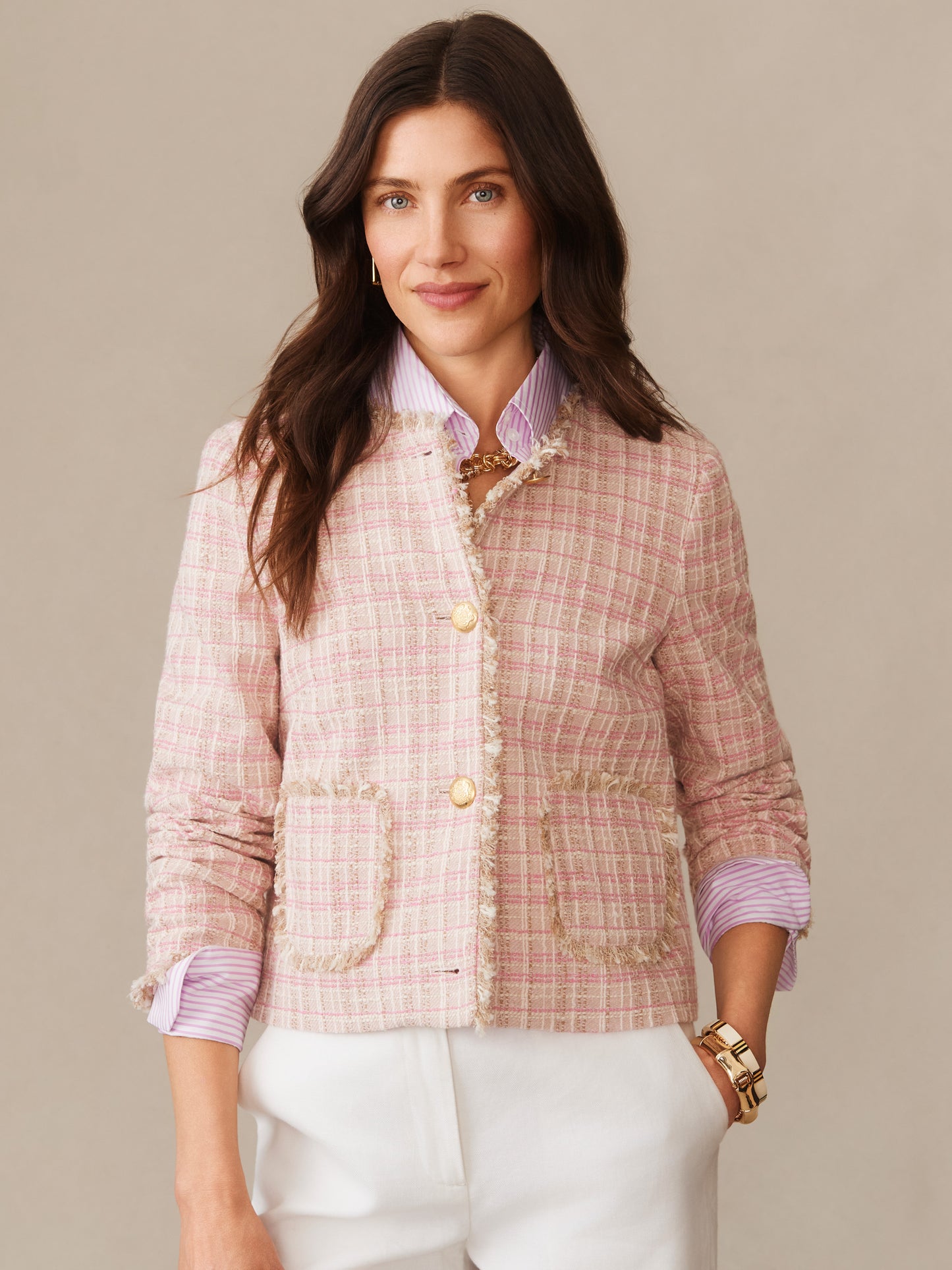 Woman wearing Abigail Bouclé Jacket in Mini Window Pane by J.McLaughlin, styled with a striped shirt and white pants, showcasing effortlessly stylish, enduring designs and innovative fabrics.