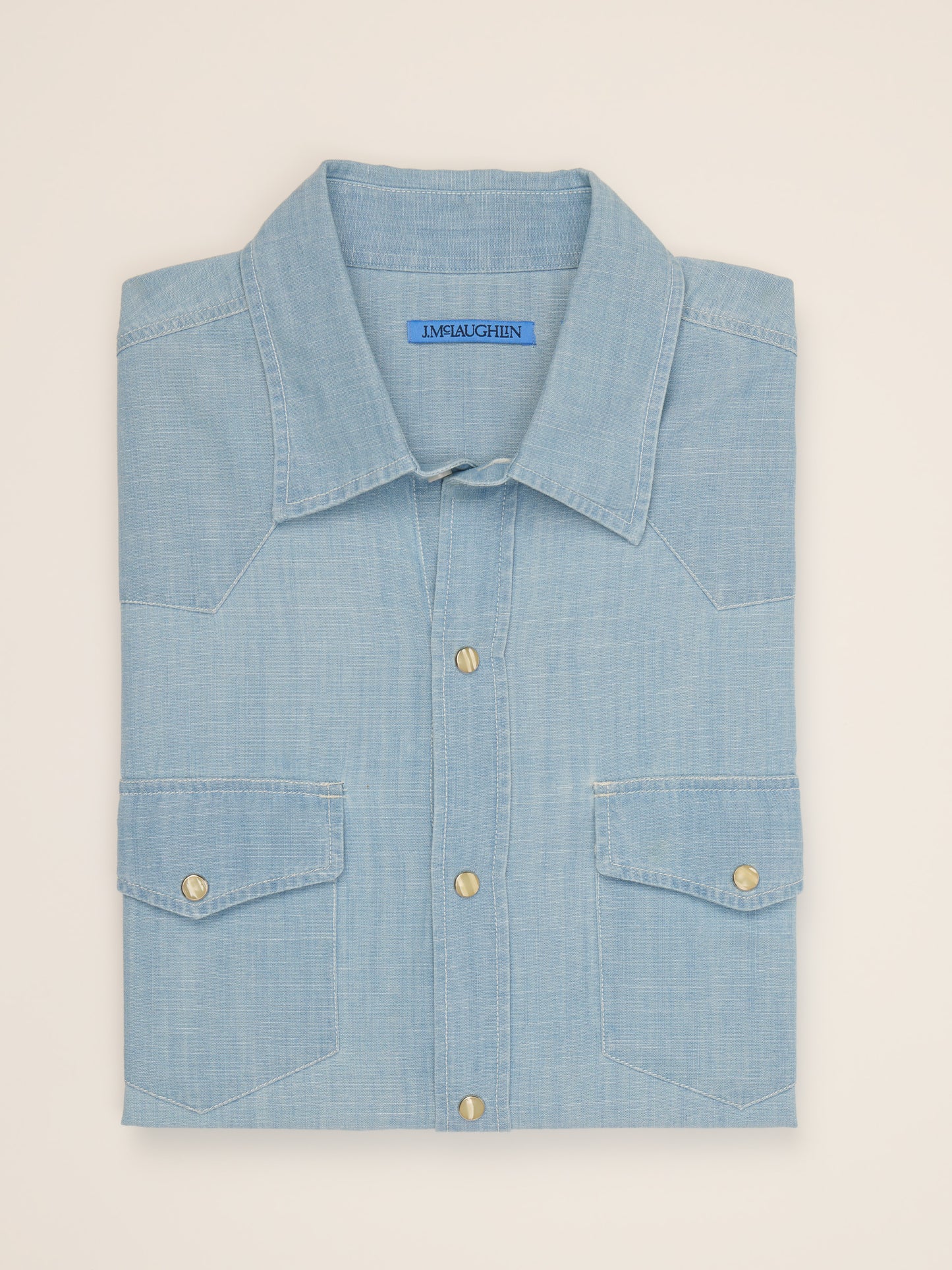 J.McLaughlin Ace high woven shirt in light denim blue made with cotton chambray.