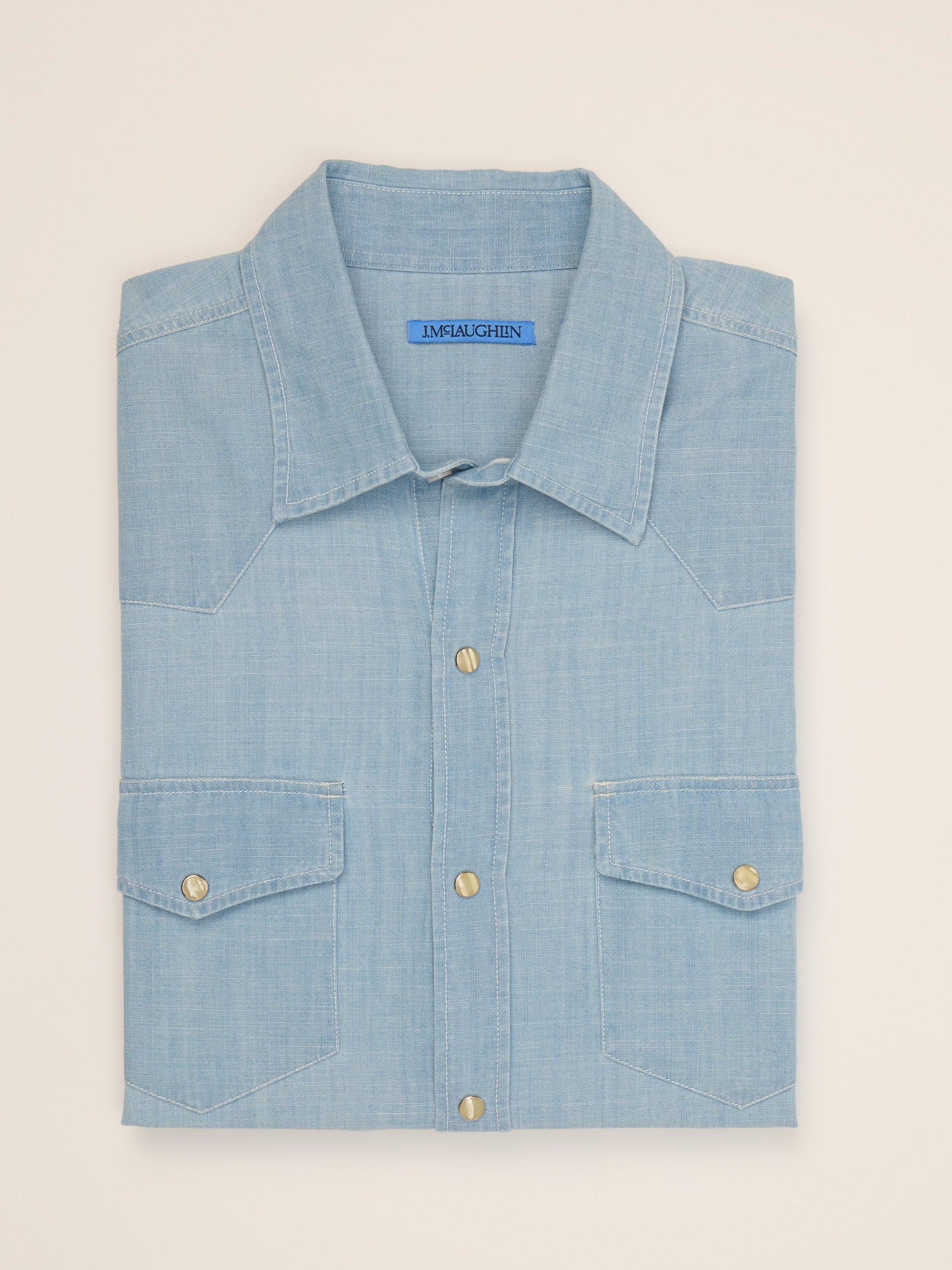J.McLaughlin Ace high woven shirt in light denim blue made with cotton chambray.