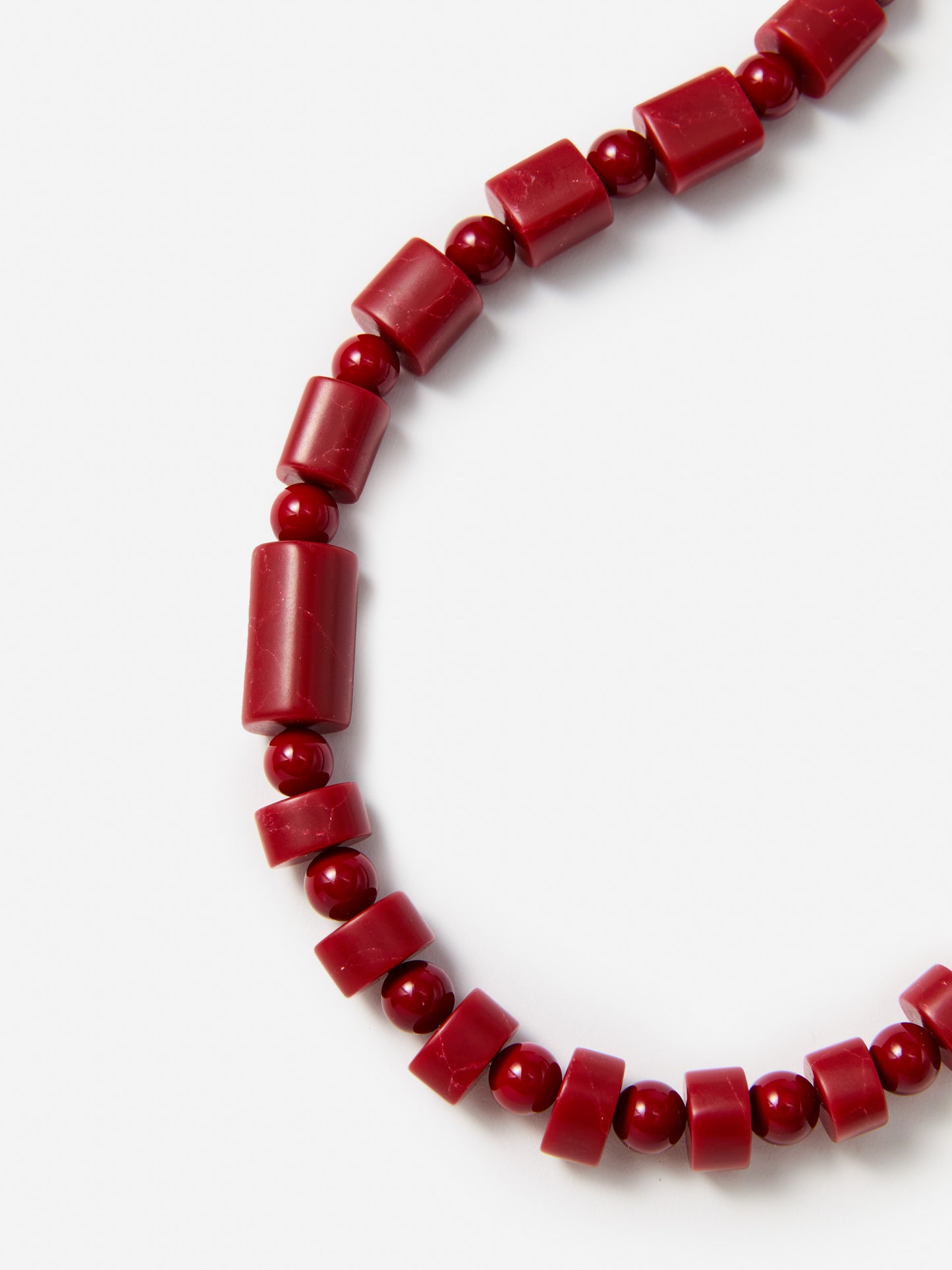 J.McLaughlin Amber bead necklace in red made with brass and resin.