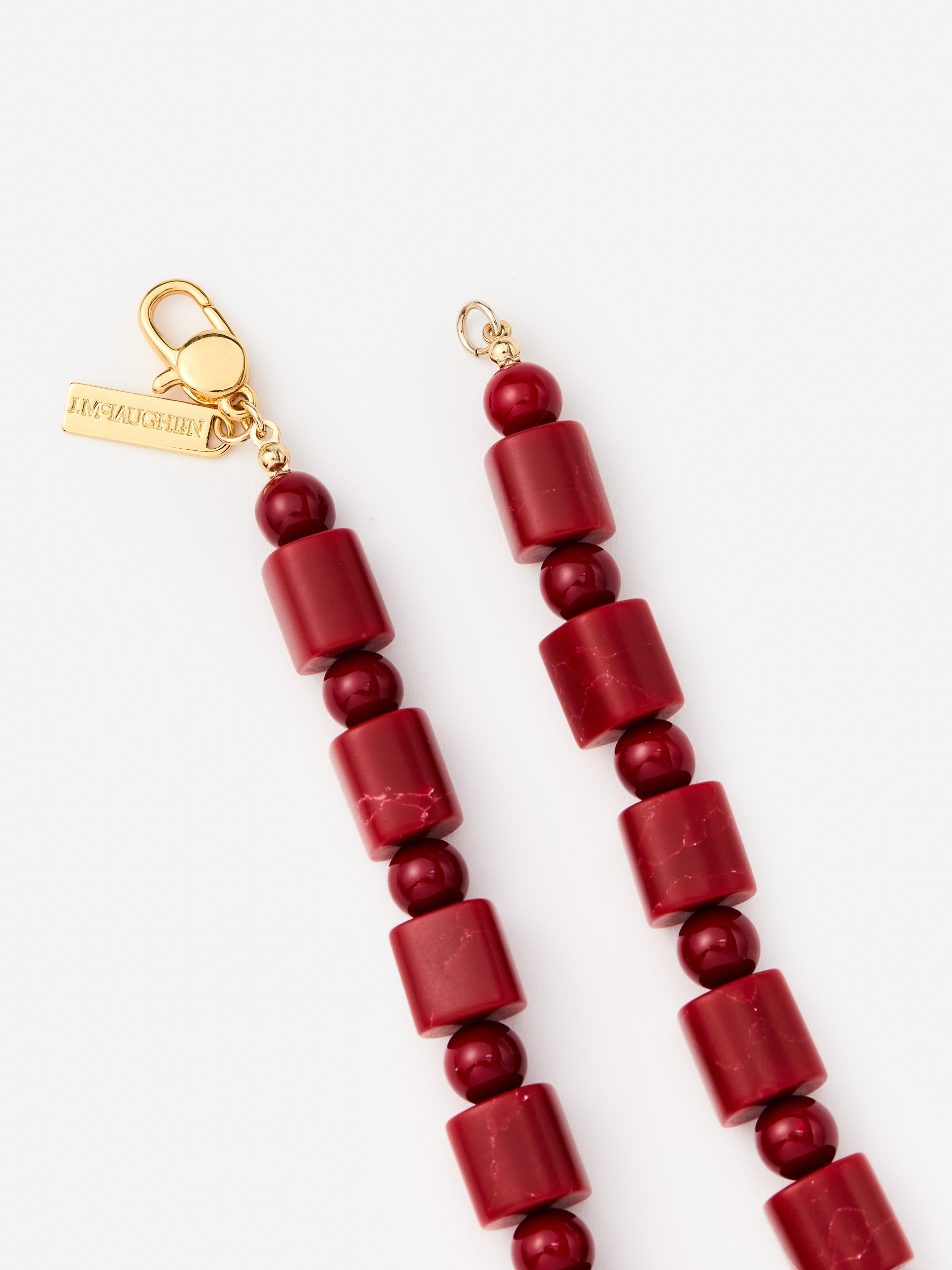 J.McLaughlin Amber bead necklace in red made with brass and resin.