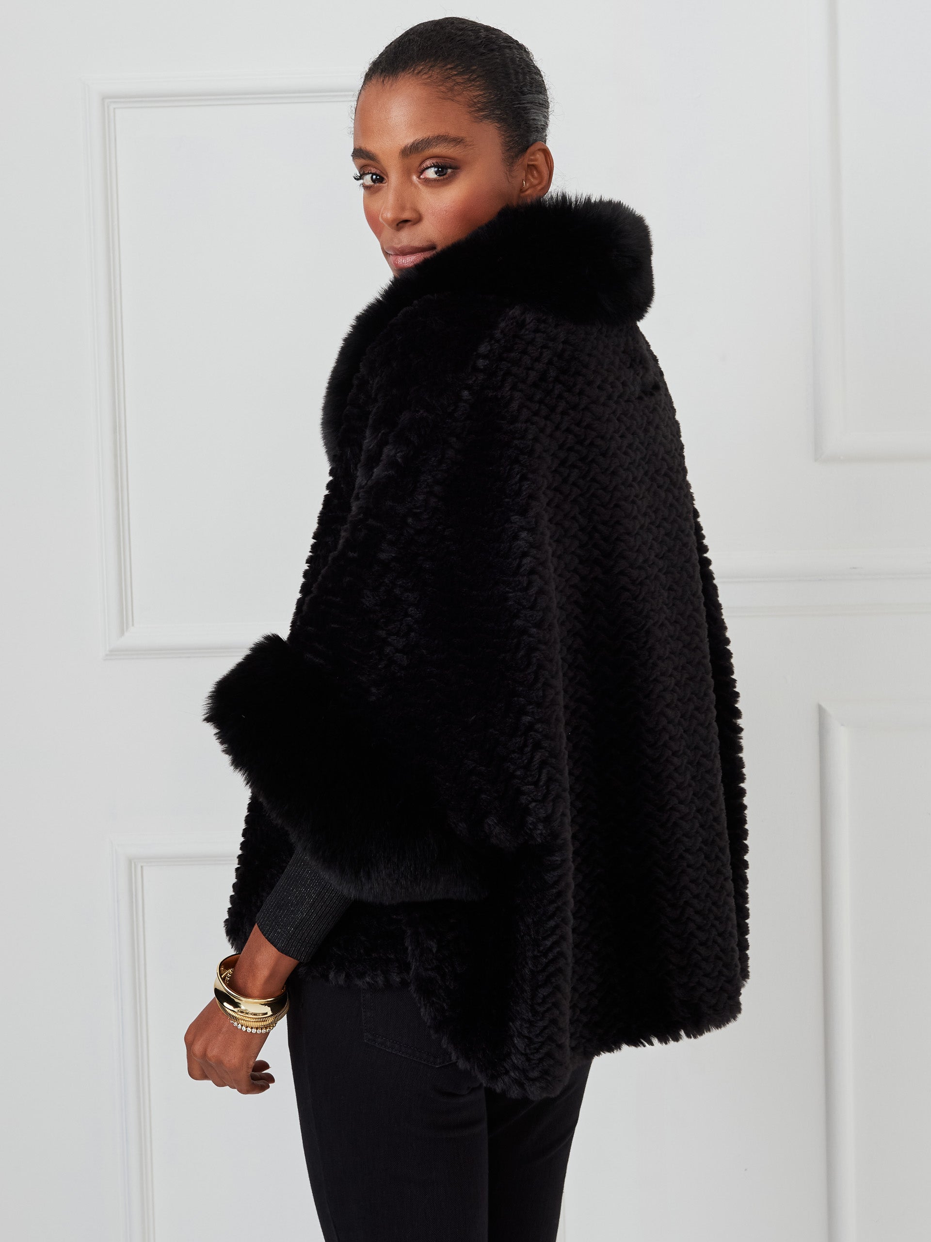 J.McLaughlin Andie ponchos in black made with faux fur. 