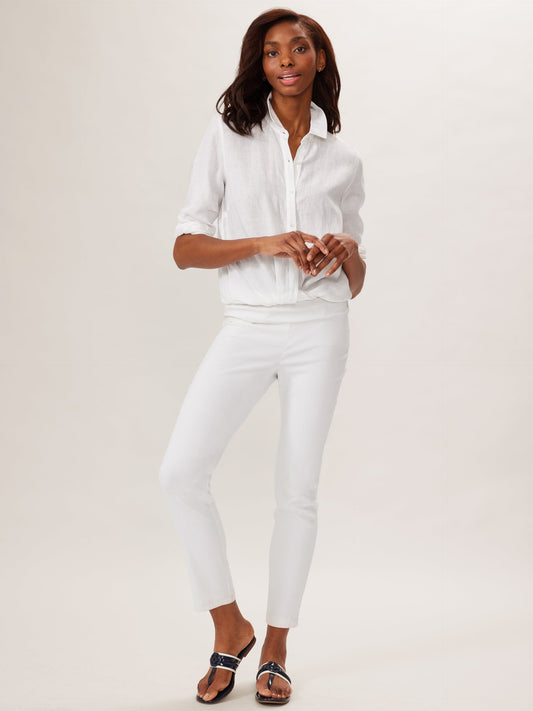 Model wearing J.McLaughlin Masie pants in white made with Amelia cloth.