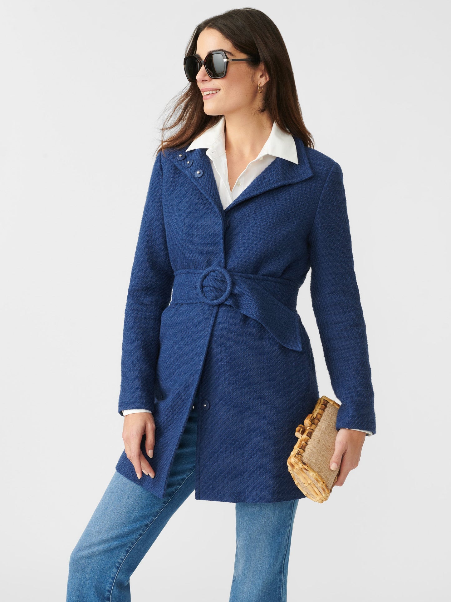 Model wears J.McLaughlin Arden Tweed Coat in navy made with cotton.