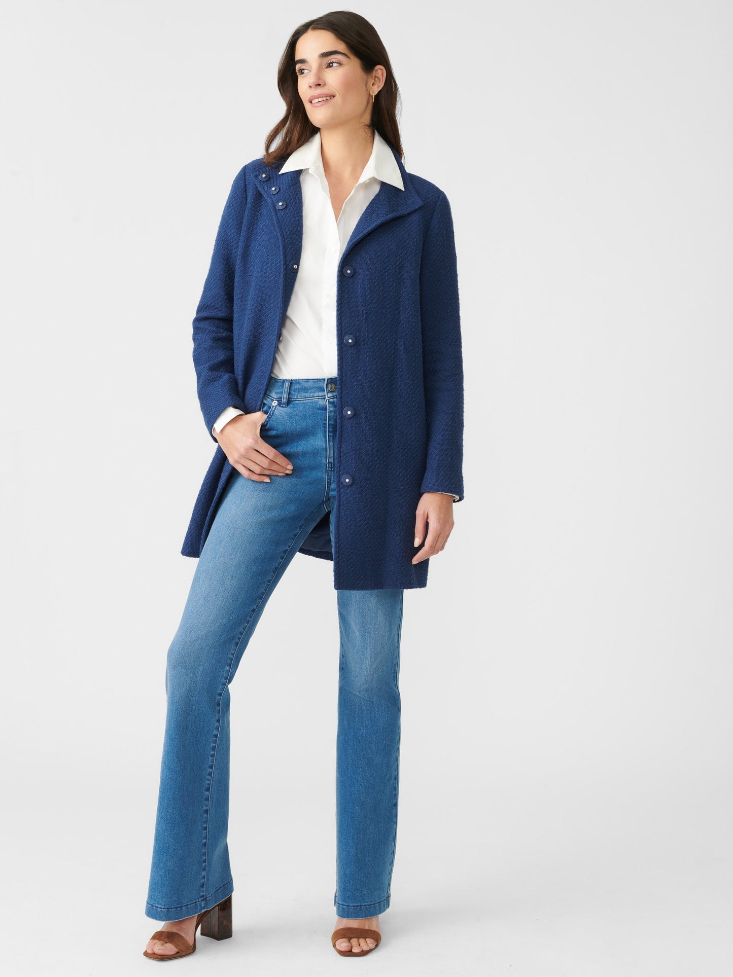 Model wears J.McLaughlin Arden Tweed Coat in navy made with cotton.