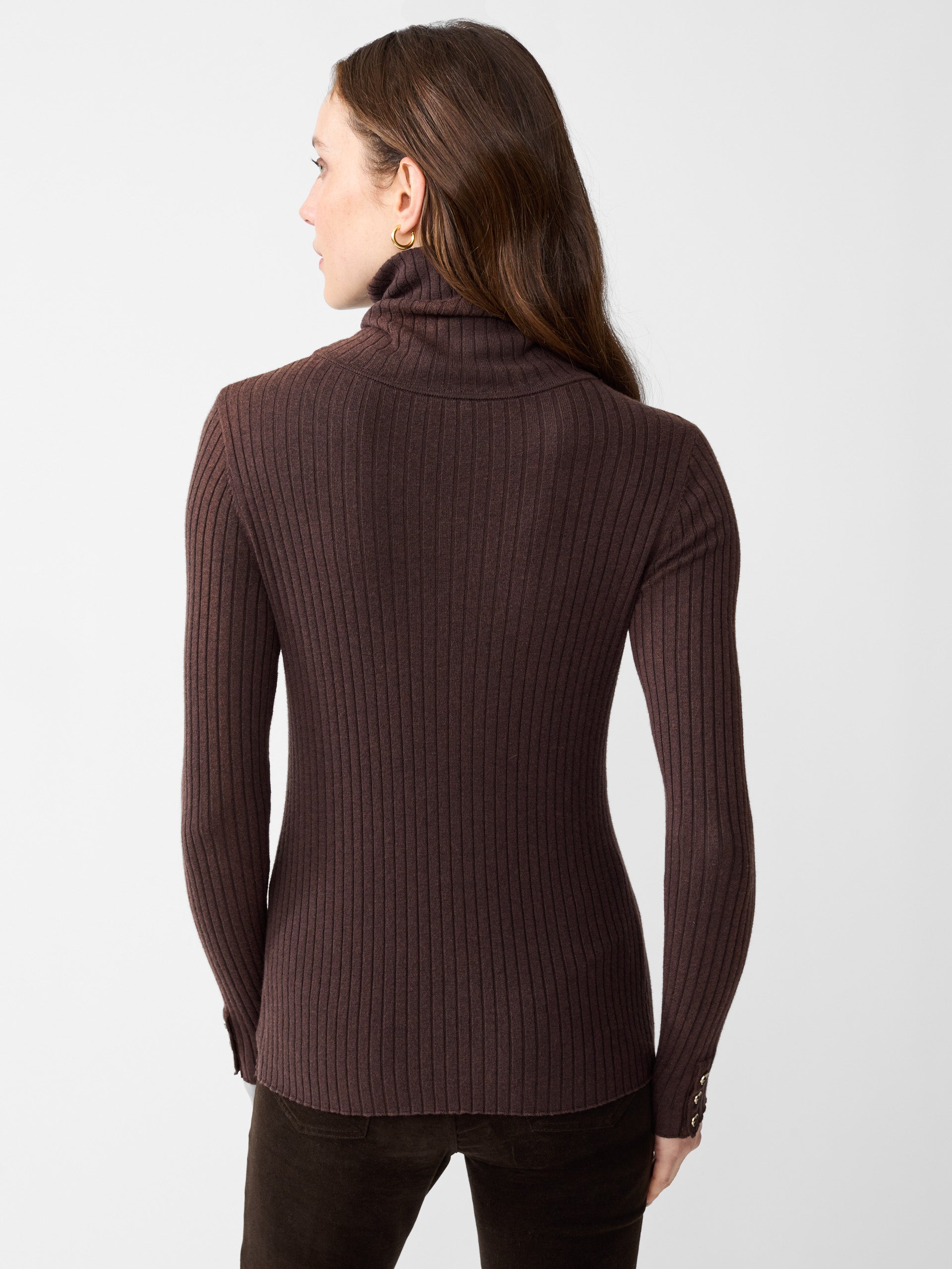 Model wearing J.McLaughlin Arlette turtleneck in heather brown made with cotton/modal.