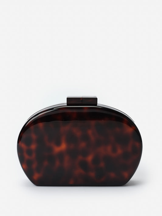 Arya Clutch in Tortoise by J.McLaughlin, an effortlessly stylish bag featuring enduring designs and innovative materials, embodying a legacy of timeless fashion. A destination for defining style. Life, Well-Lived.