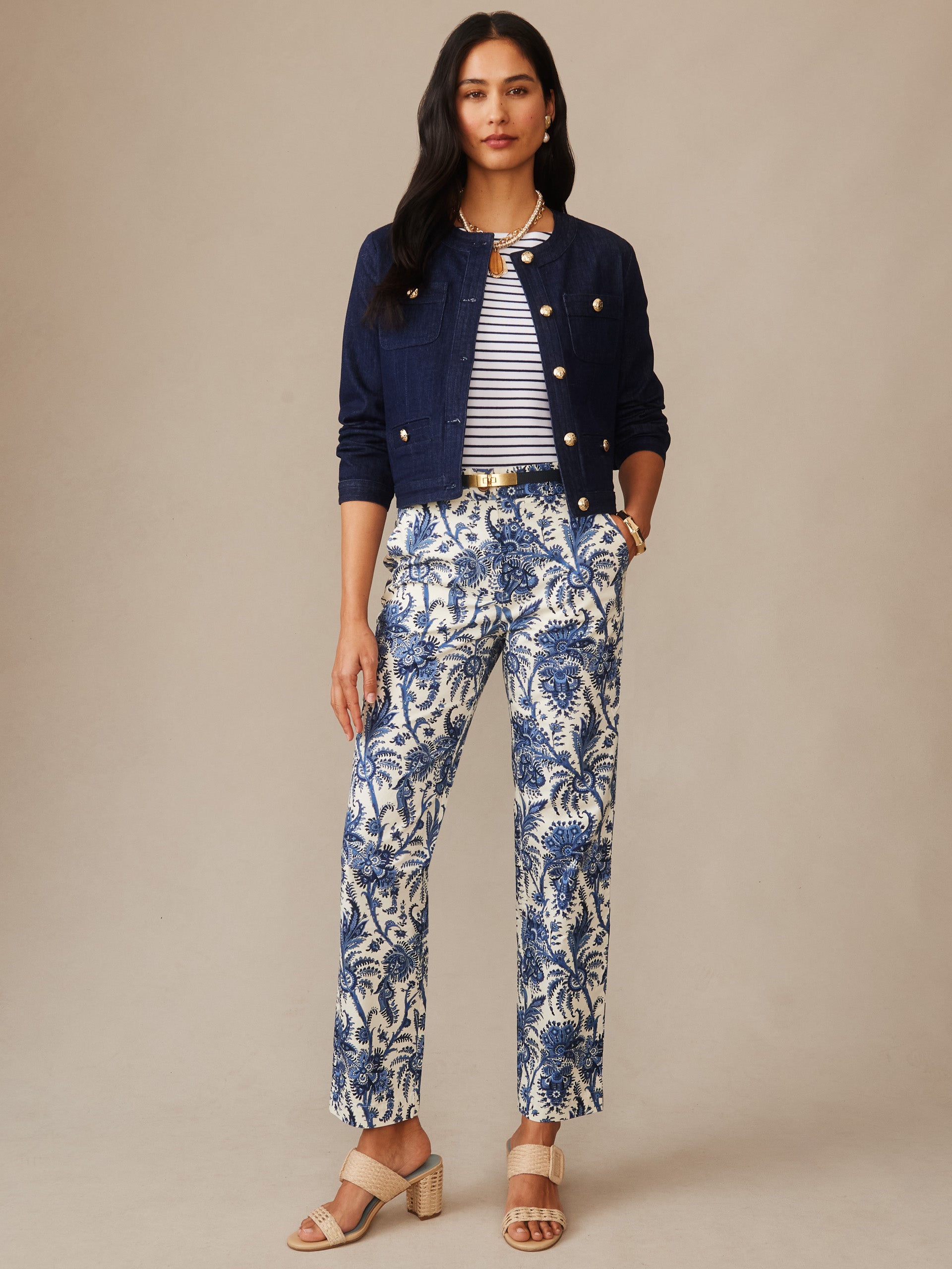 A woman wearing Avery Pants in Heirloom Paisley styled with a navy jacket, striped top, and beige heels, showcasing J. McLaughlin’s effortlessly stylish, enduring designs.