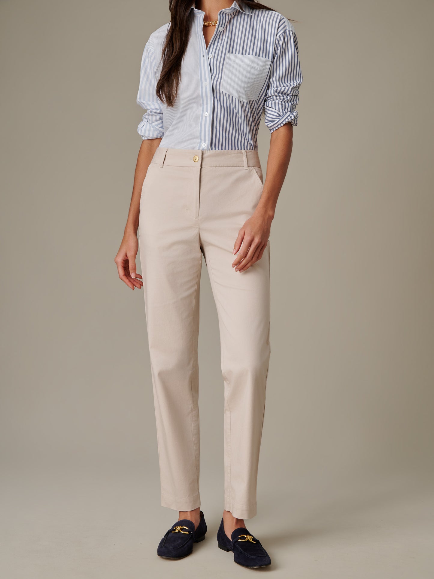 Woman wearing Avery Cotton Chino Pants by J.McLaughlin paired with a stylish button-up shirt and navy loafers, showcasing timeless, effortlessly stylish design.