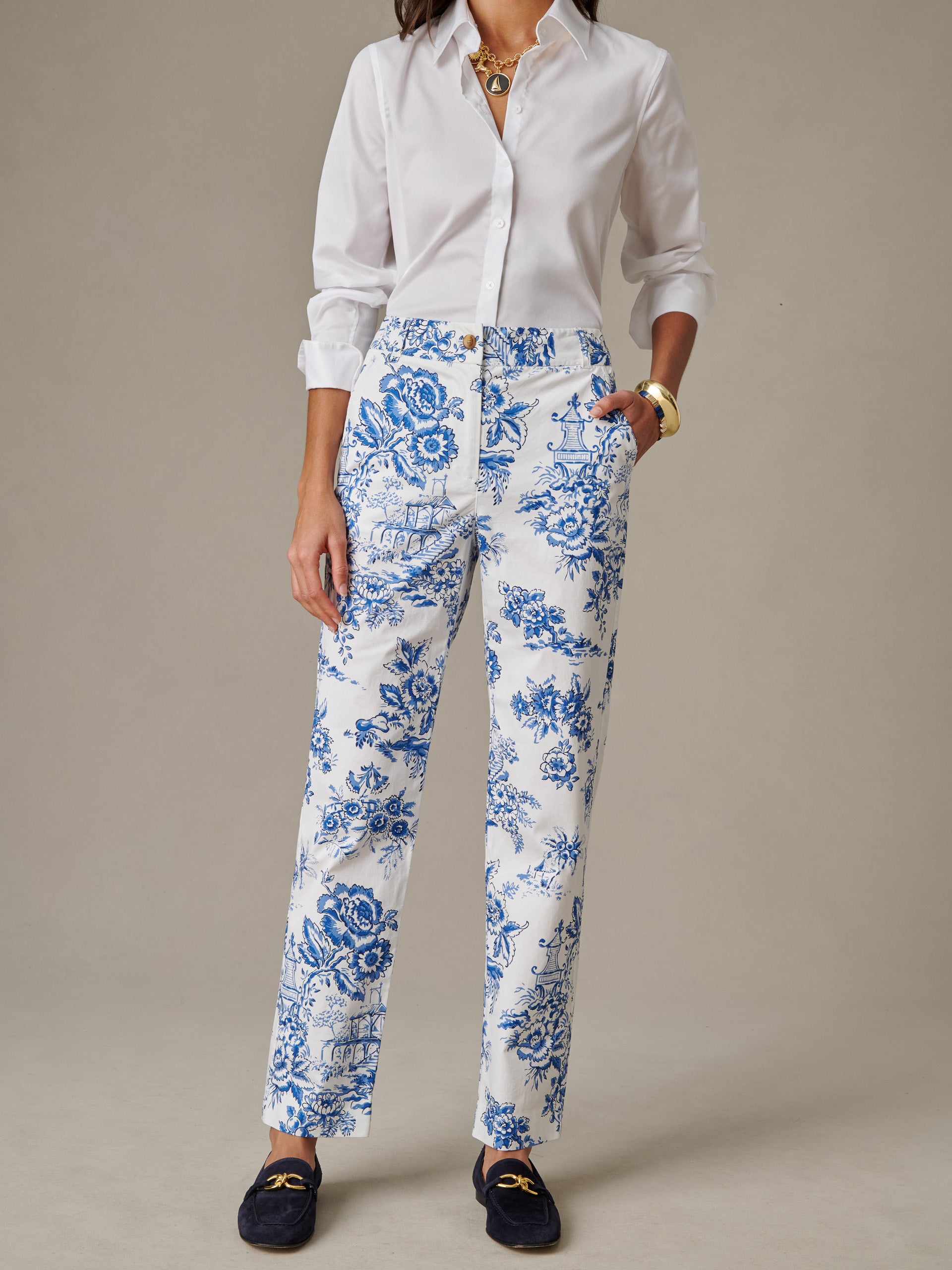 Woman wearing Avery Pants in Antique Toile by J.McLaughlin paired with a crisp white blouse and navy loafers, showcasing effortlessly stylish, enduring designs for a timeless look.