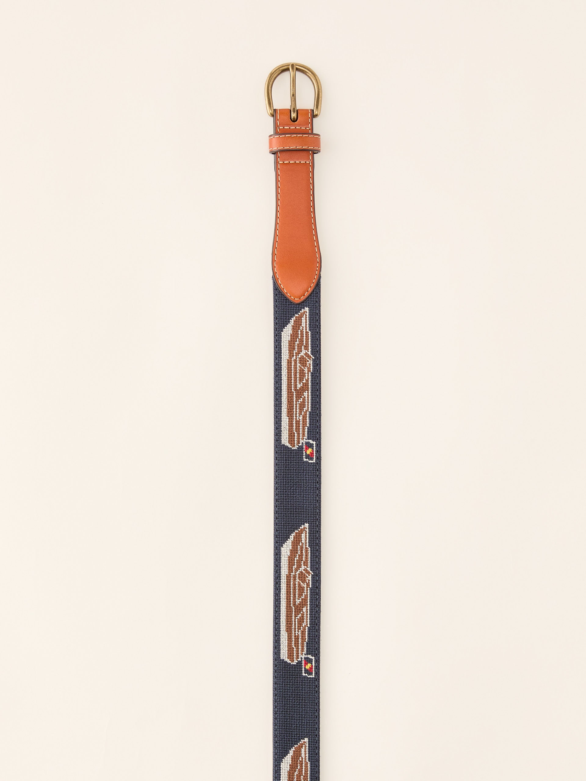 J.McLaughlin Needlepoint belt in navy made with leather and cotton needlepoint fabric.