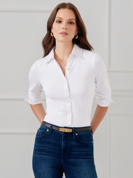 Model wearing J.McLaughlin Betty shirt in white made with Catalina cloth.