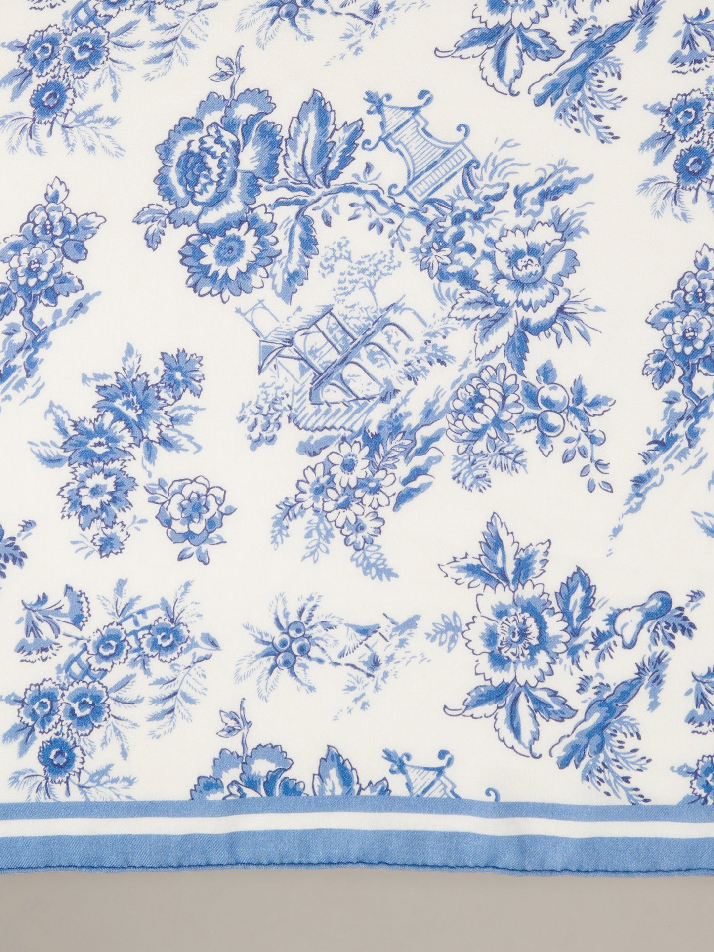 The Blair Scarf in Antique Toile Corner by J.McLaughlin featuring an elegant blue and white floral toile pattern with a classic border.
