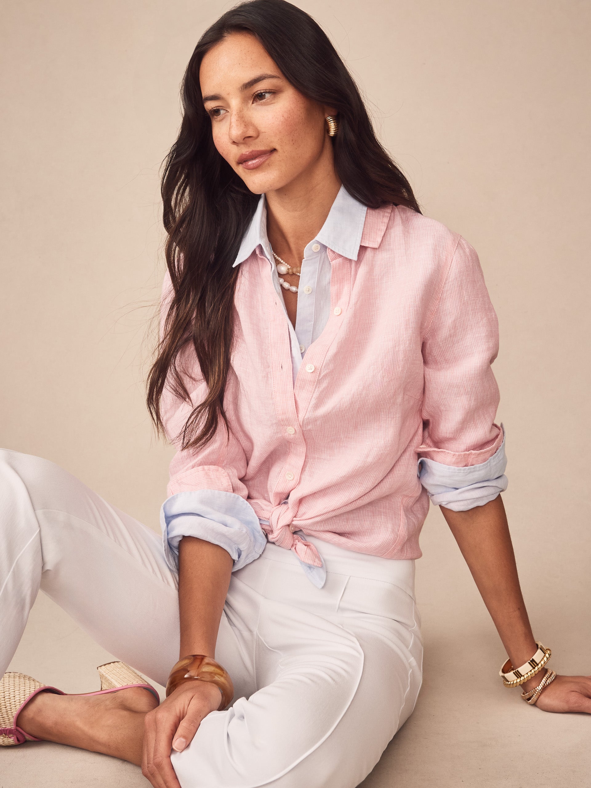 Model wearing J.McLaughlin Britt linen shirt in pink/white made with linen.