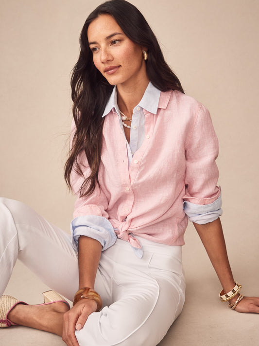 Model wearing J.McLaughlin Britt linen shirt in pink/white made with linen.