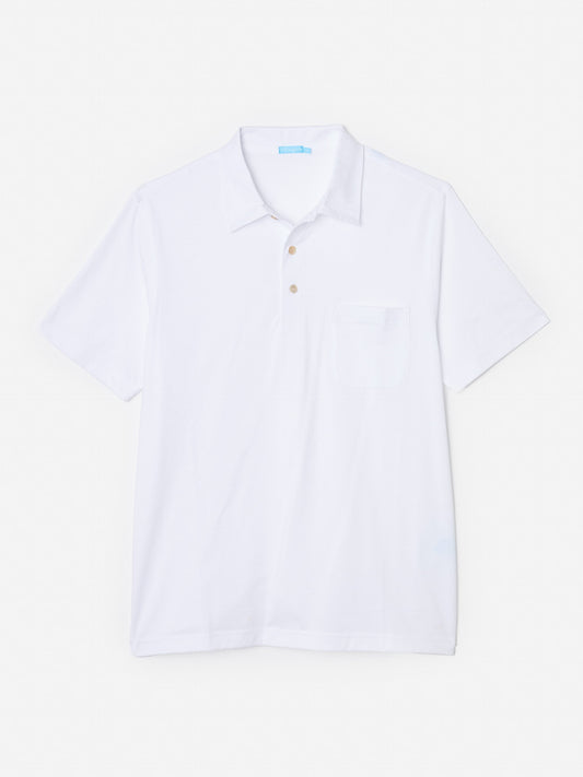Model wearing J.McLaughlin Callahan polo in white made with cotton.