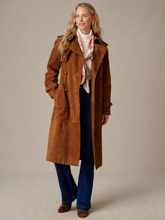 J.McLaughlin Campbell Suede Trench Coat in brown suede with belted double-breasted styling worn by a woman with a scarf and jeans