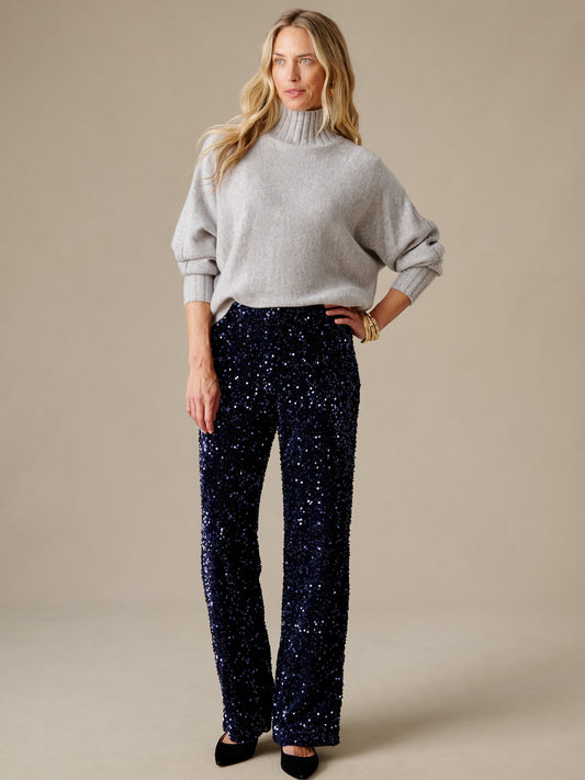 Carter Sequin Pants by J.McLaughlin in shimmering dark sequins with a flattering wide leg silhouette styled with a gray sweater