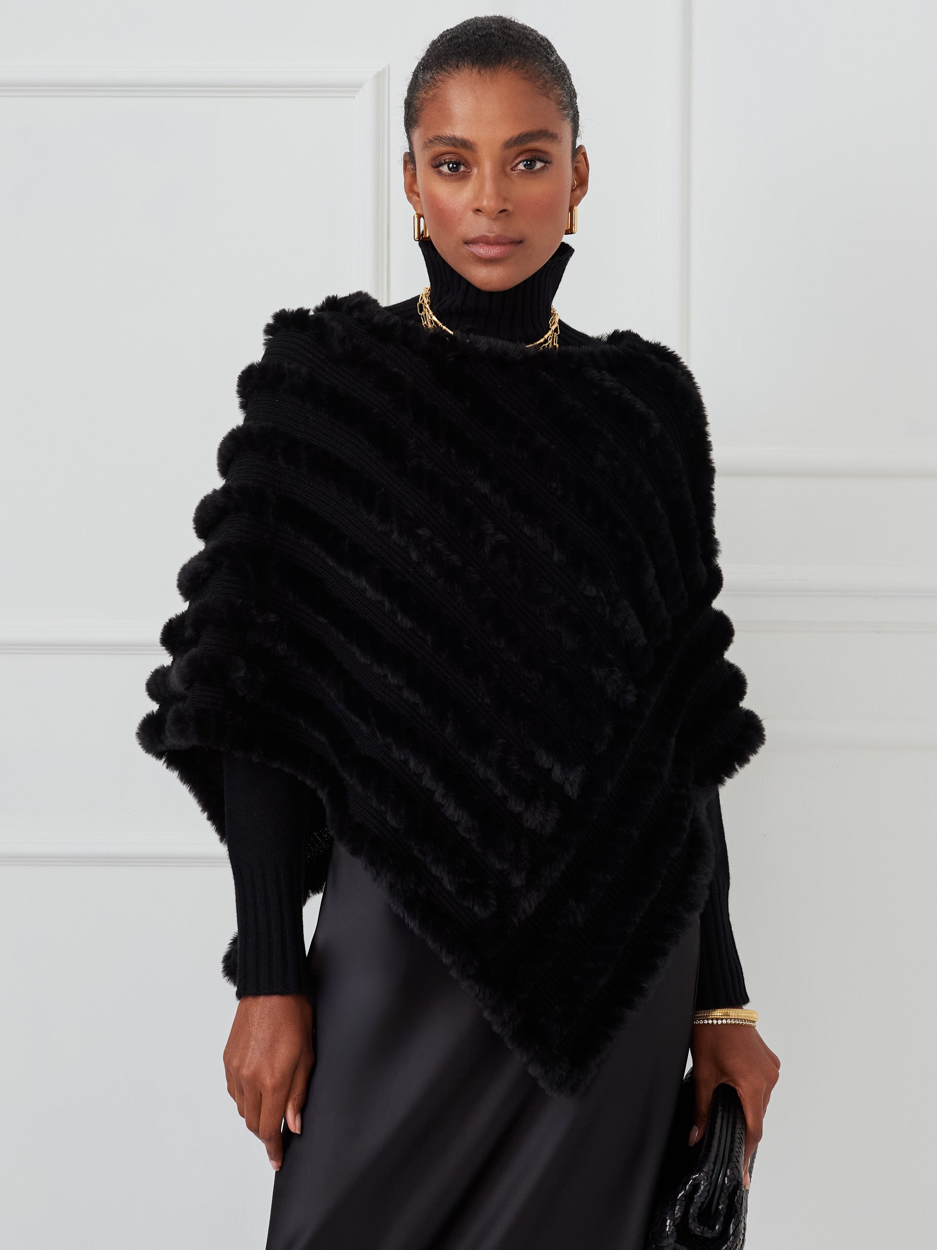 J.McLaughlin Charlie poncho in black made with faux fur. 