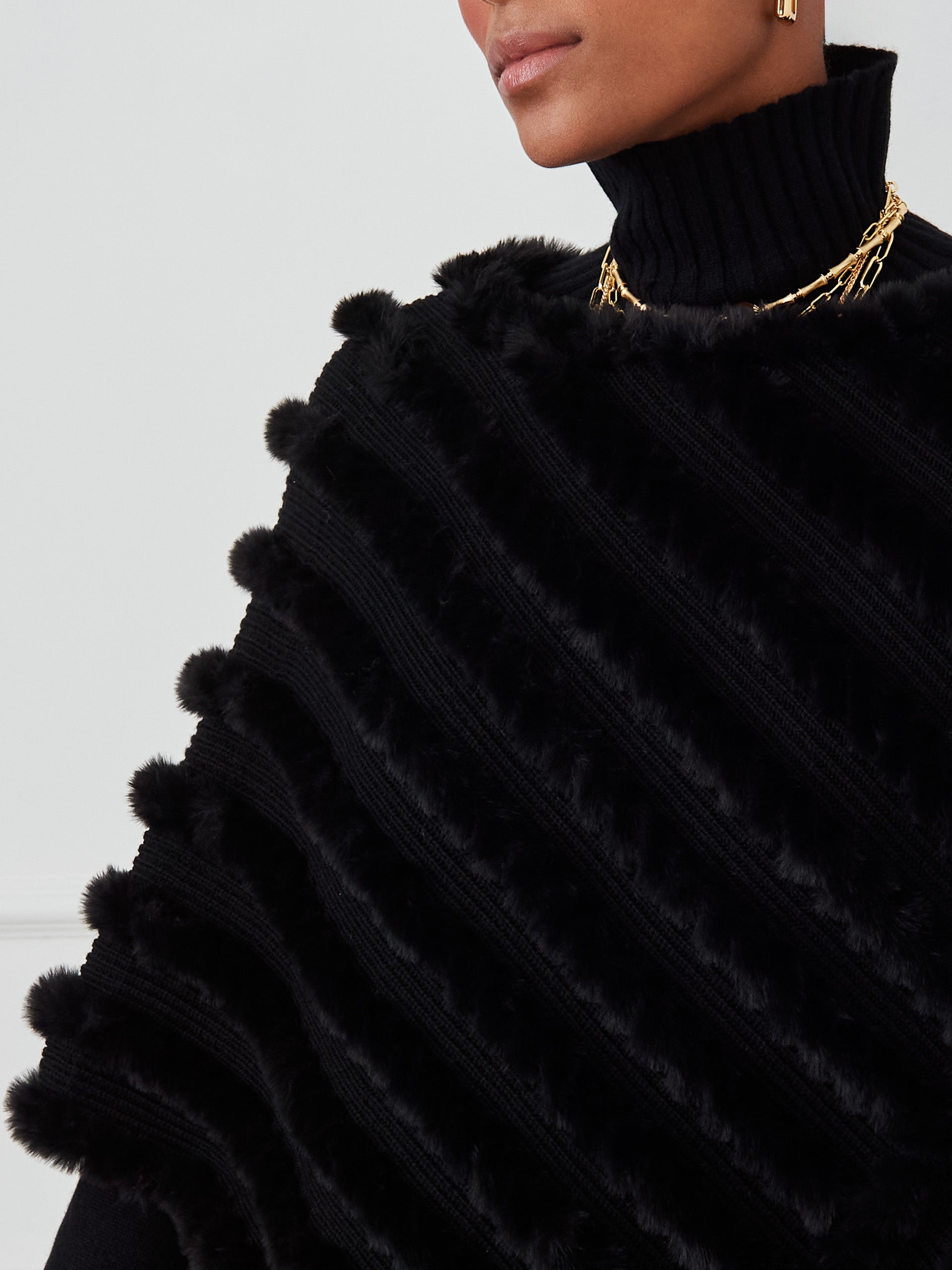 J.McLaughlin Charlie poncho in black made with faux fur. 