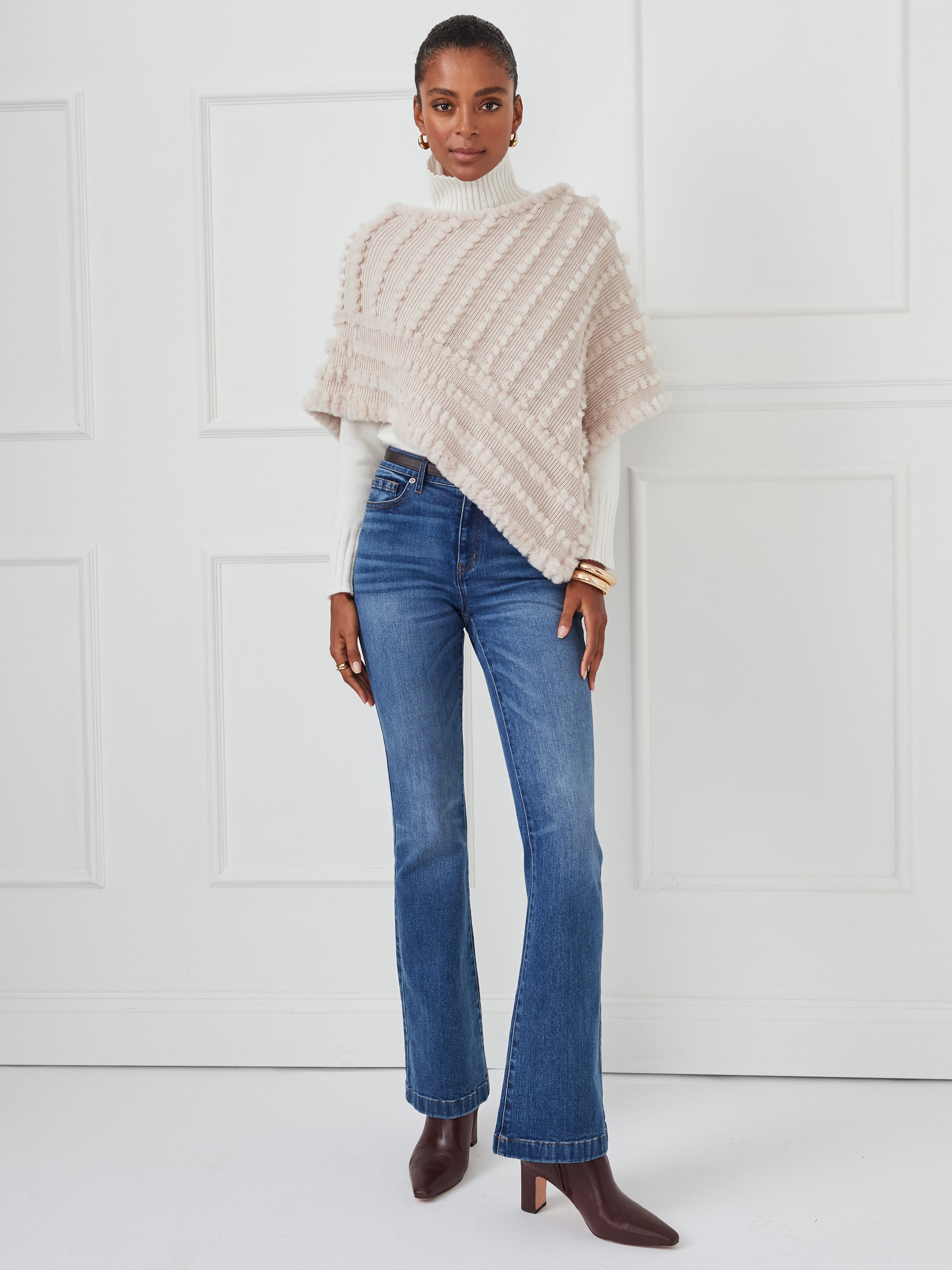 J.McLaughlin Charlie poncho in cream made with faux fur. 