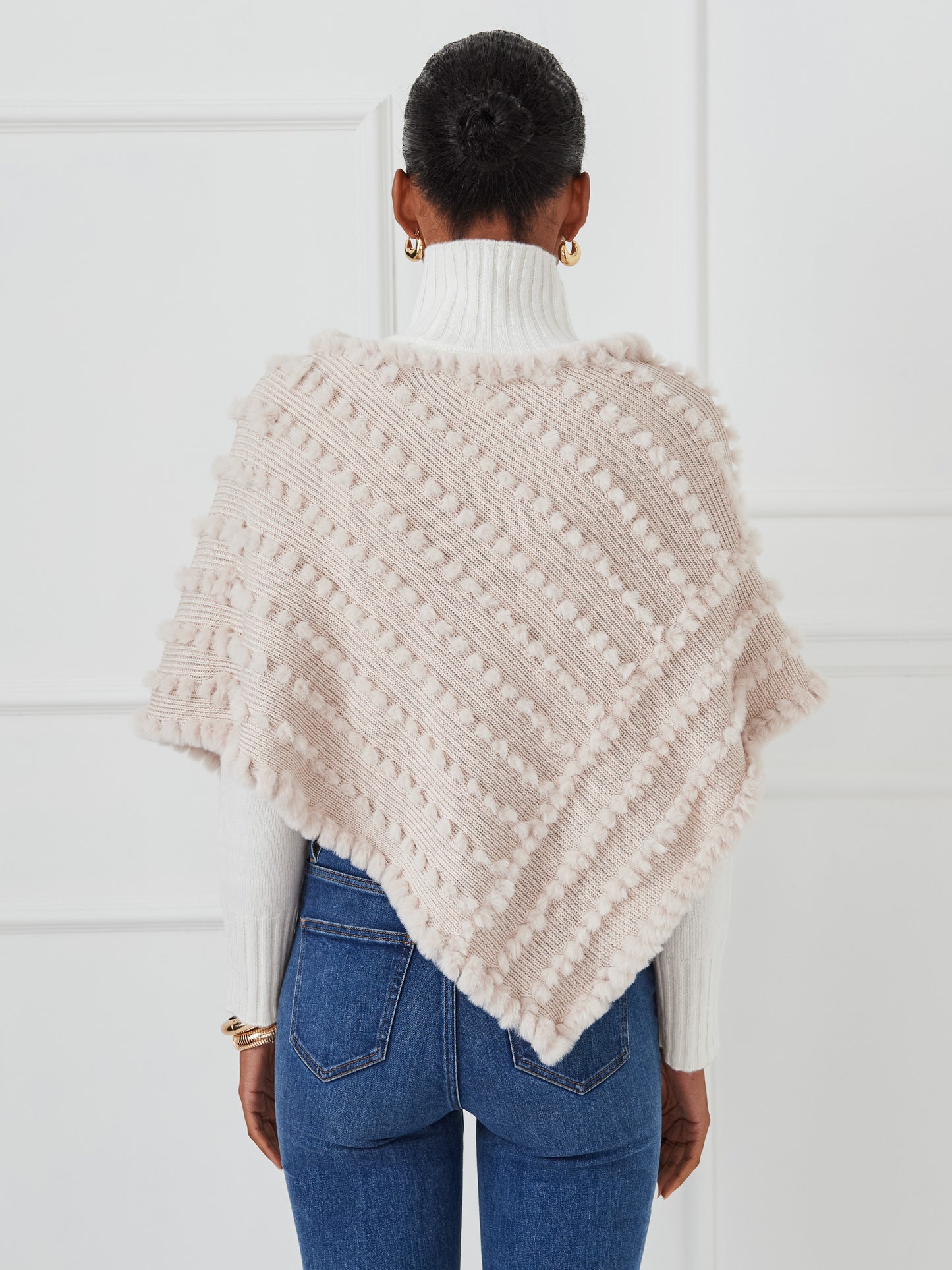 J.McLaughlin Charlie poncho in cream made with faux fur. 