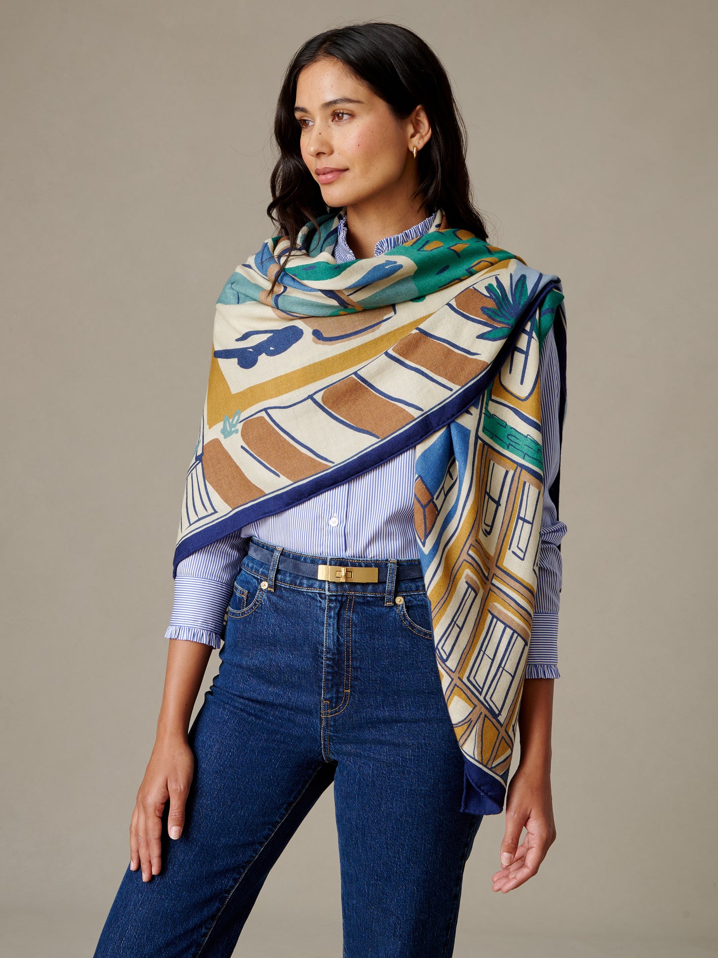 J.McLaughlin The Charlotte Scarf in Village Stroll Border worn as a colorful draped scarf with a soft cashmere silk blend and classic geometric motifs
