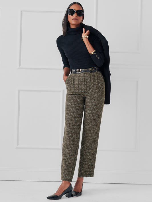 Model wearing J.McLaughlin Colleen pants in green made with poly/cotton.