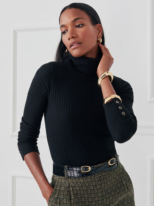 Model wearing J.McLaughlin Arlette turtleneck in black made with cotton/modal.