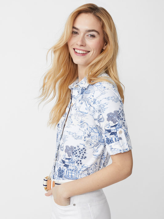 Model wears J.McLaughlin Cornelia top in white/blue made with Catalina Cloth.