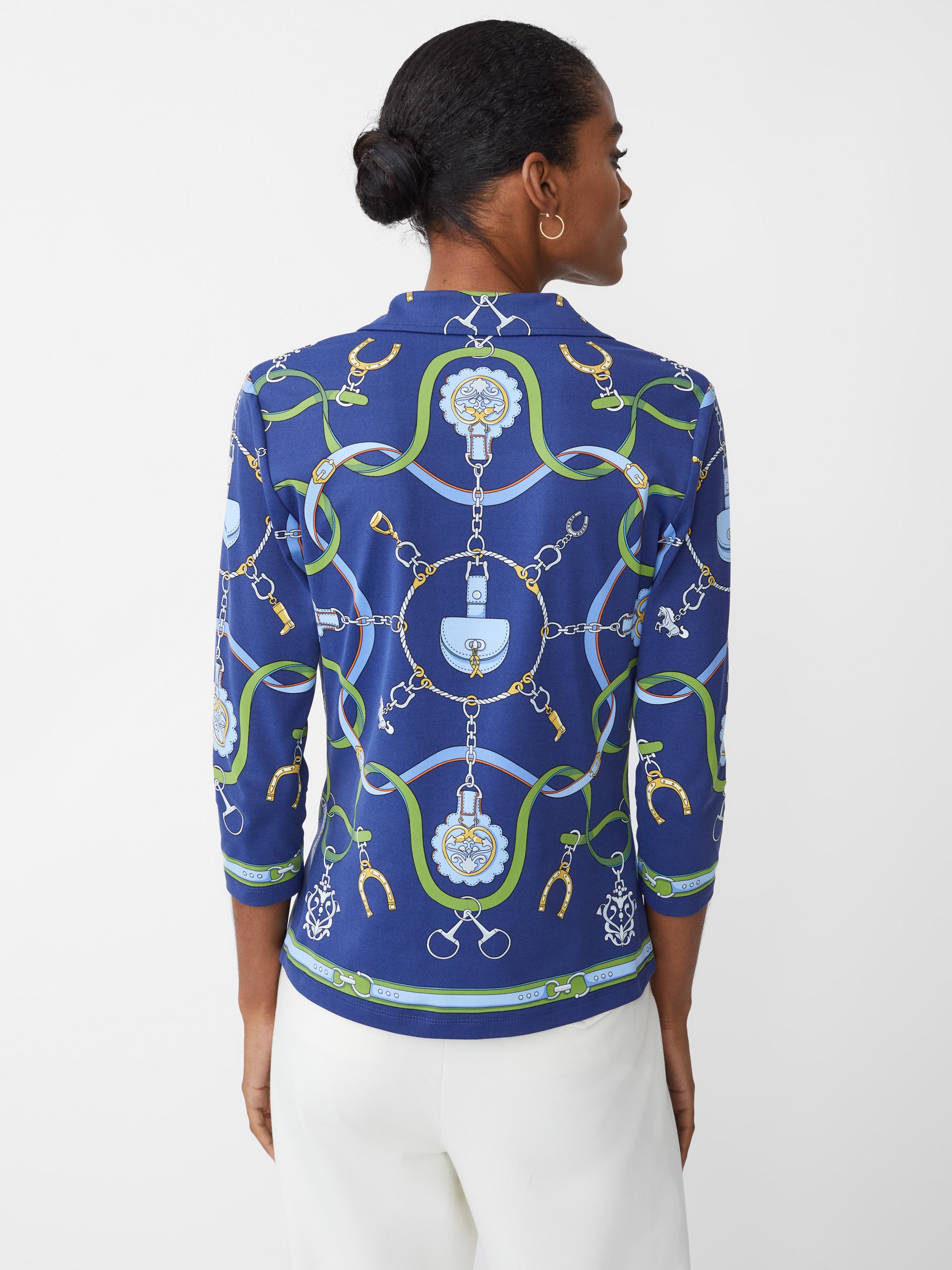 Model wearing J.McLaughlin Court 3/4 sleeve polo in navy/green/blue made with Catalina cloth.