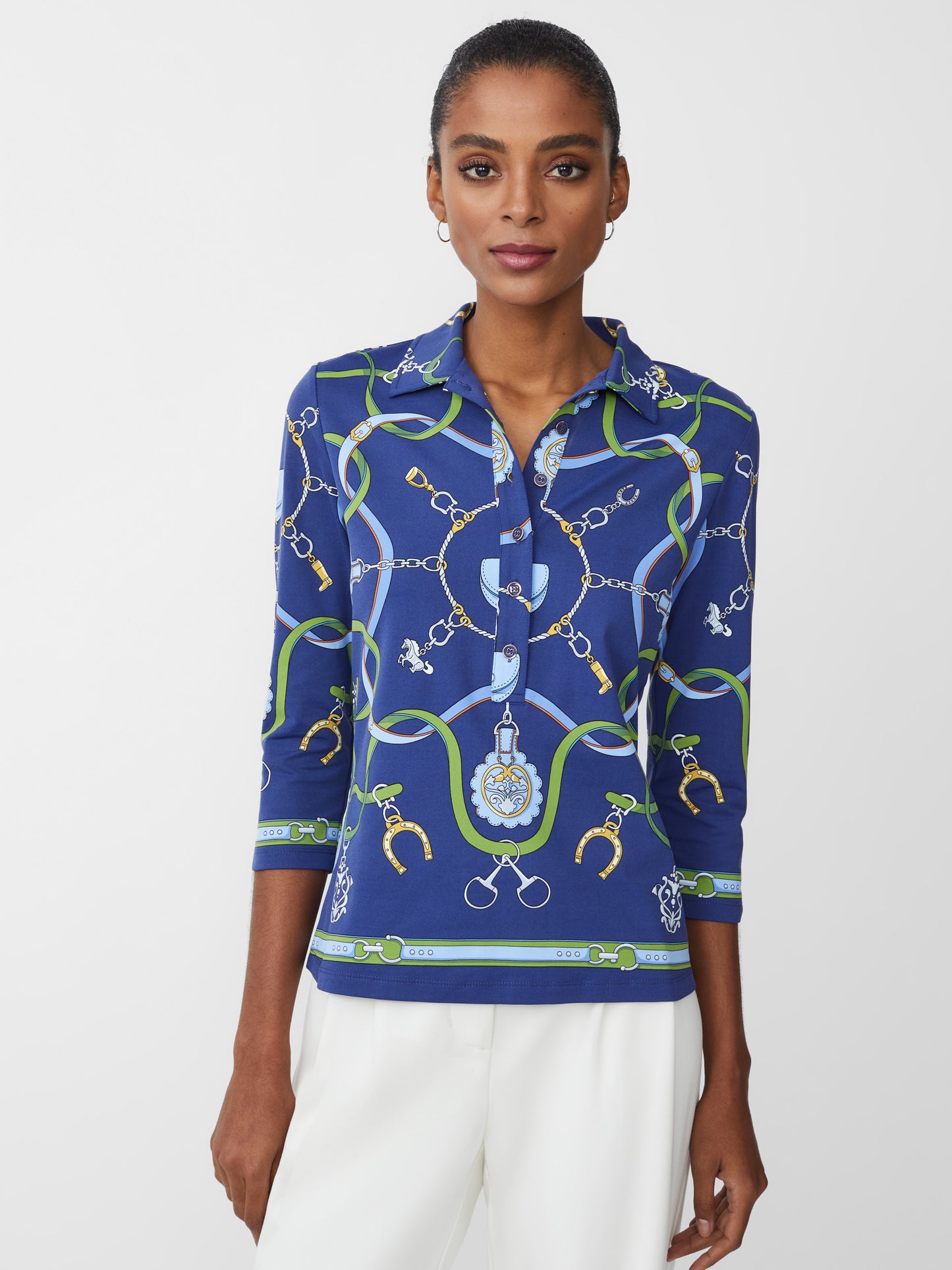Model wearing J.McLaughlin Court 3/4 sleeve polo in navy/green/blue made with Catalina cloth.