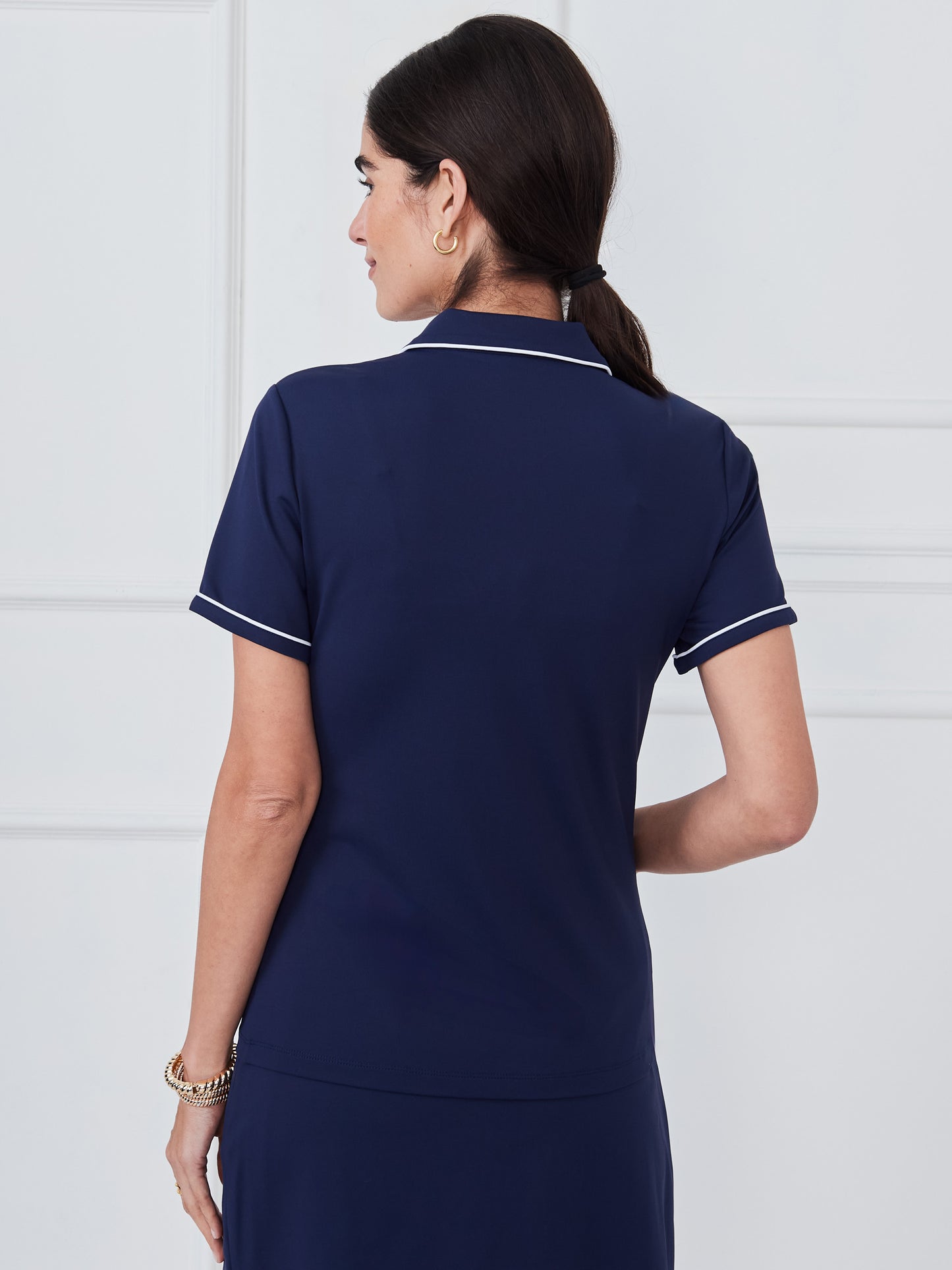 J.McLaughlin Court cap sleeve polo in winter navy made with catalina cloth. 