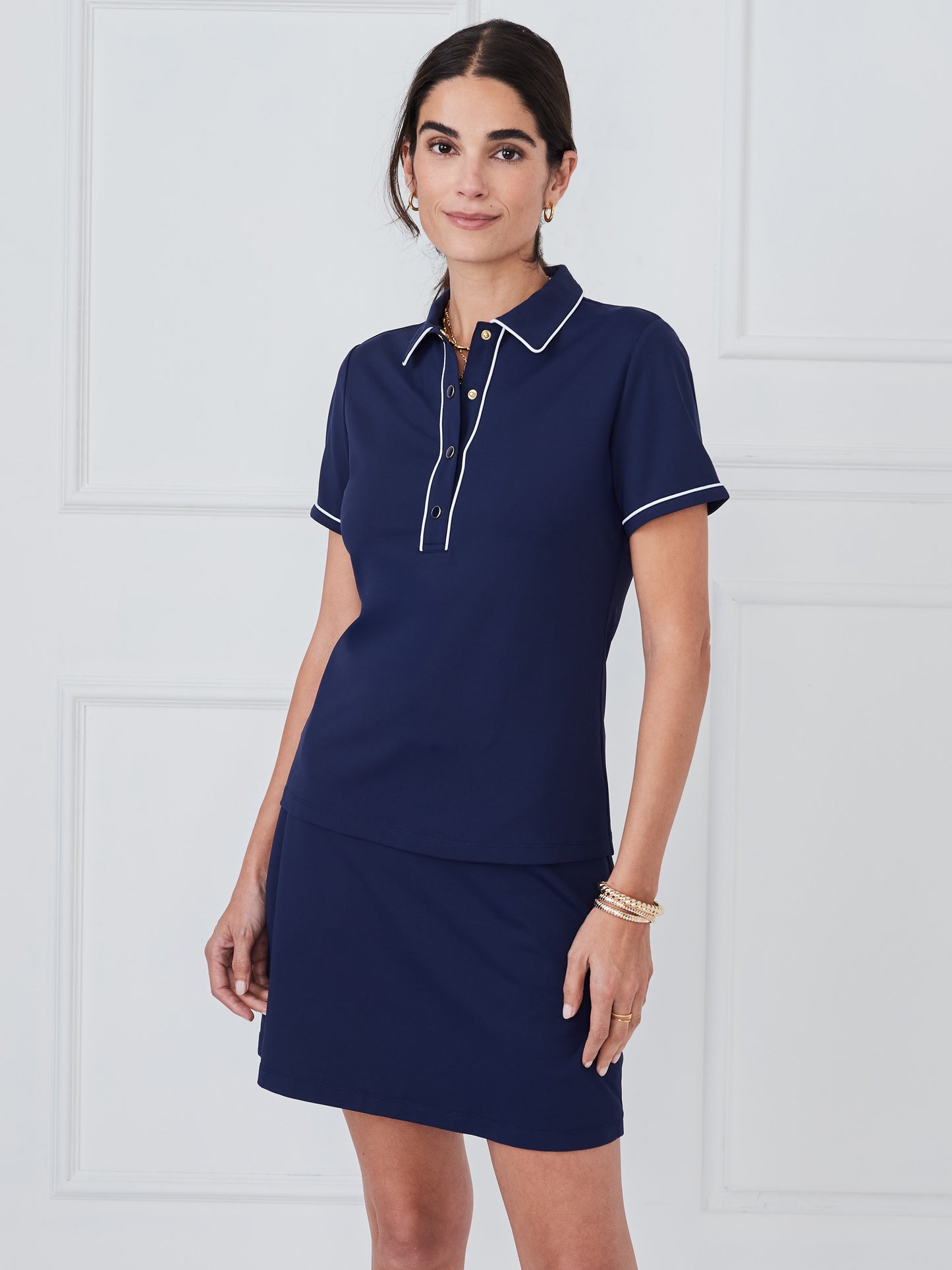 J.McLaughlin Court cap sleeve polo in winter navy made with catalina cloth. 