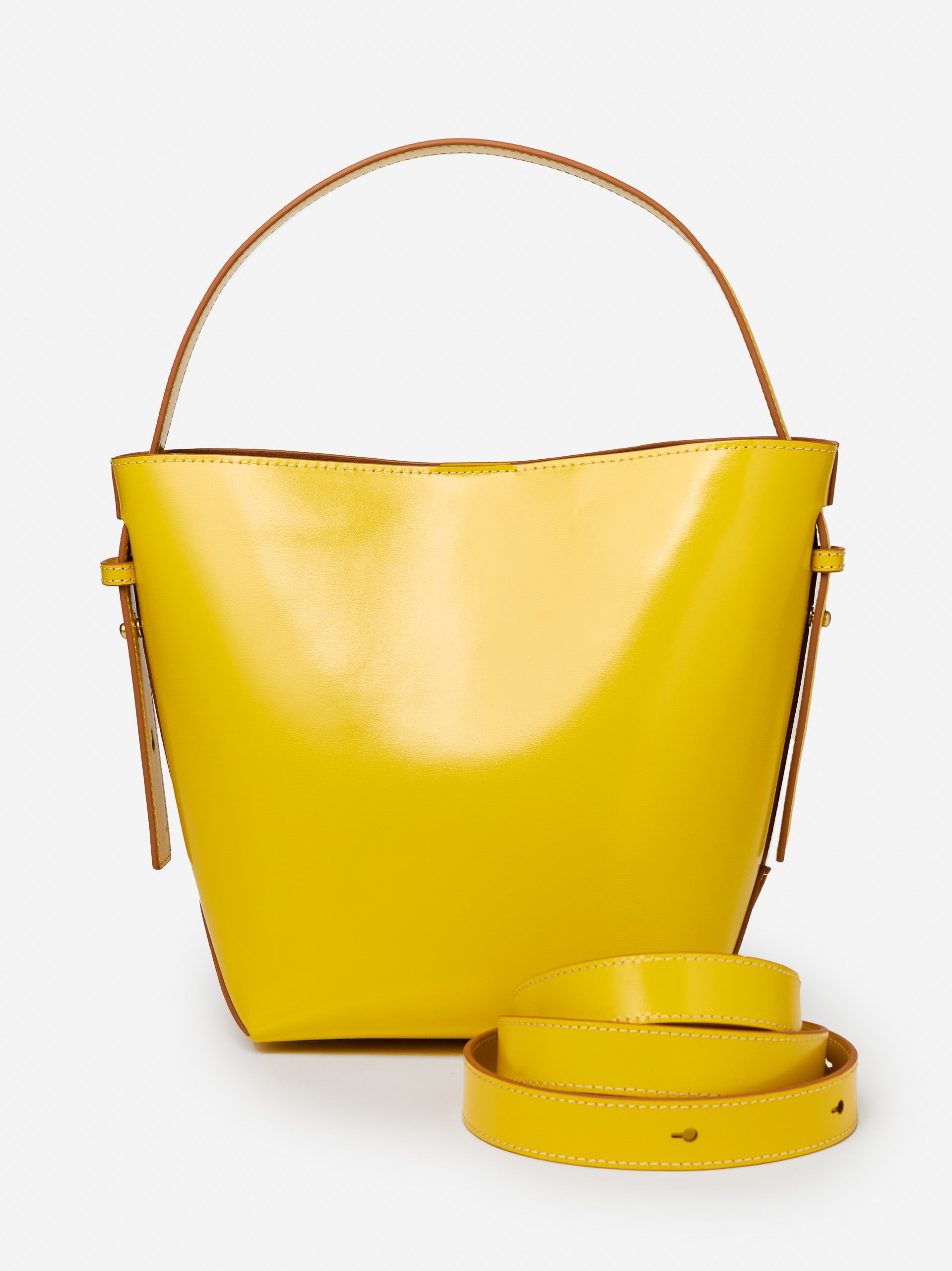 J.McLaughlin Crawford bucket bag in yellow/vachetta made with leather.