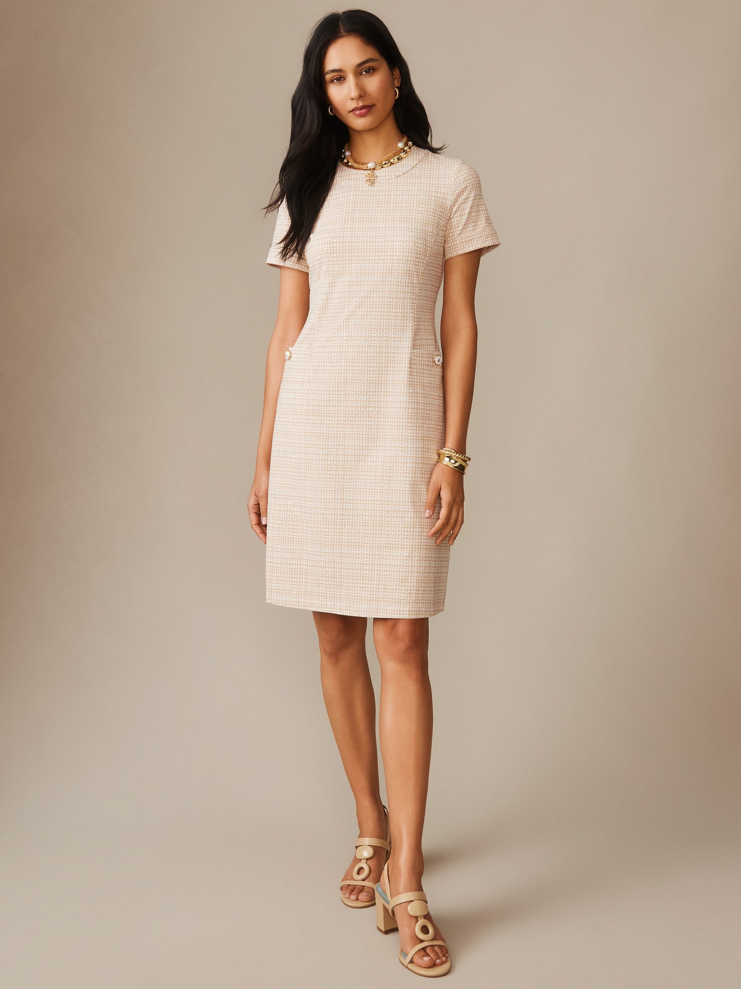 Woman wearing a timeless, effortlessly stylish Daphne Dress in Pocket Square by J.McLaughlin, featuring classic lines and enduring design perfect for a destination for defining style. Life, Well-Lived.