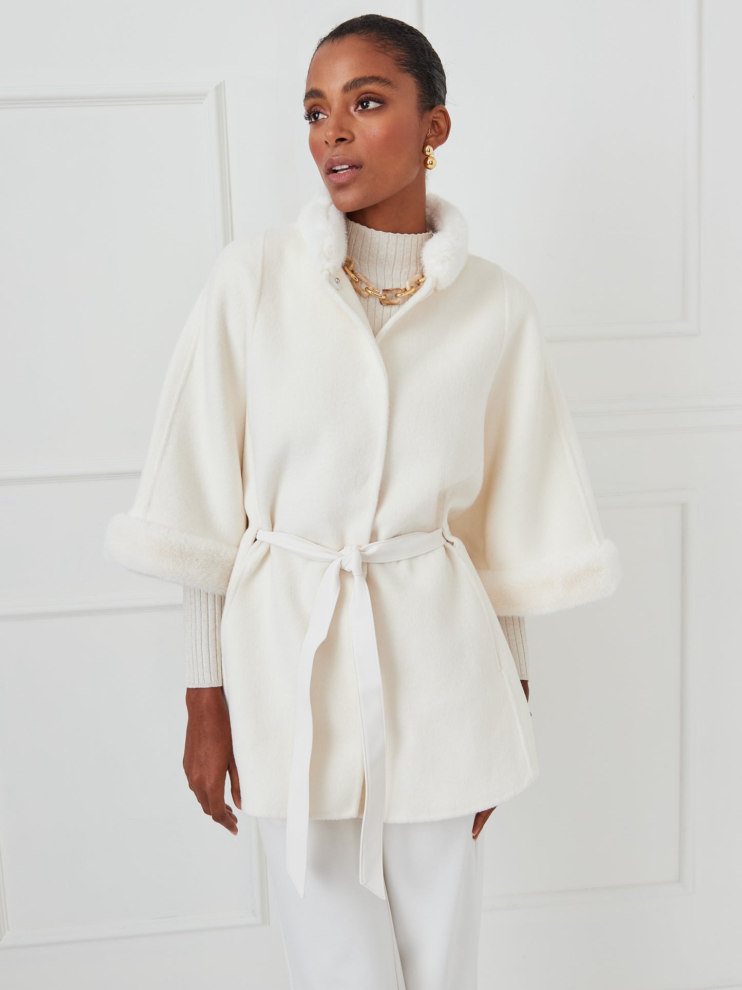 J.McLaughlin Davos poncho in cream made with faux fur/wool.