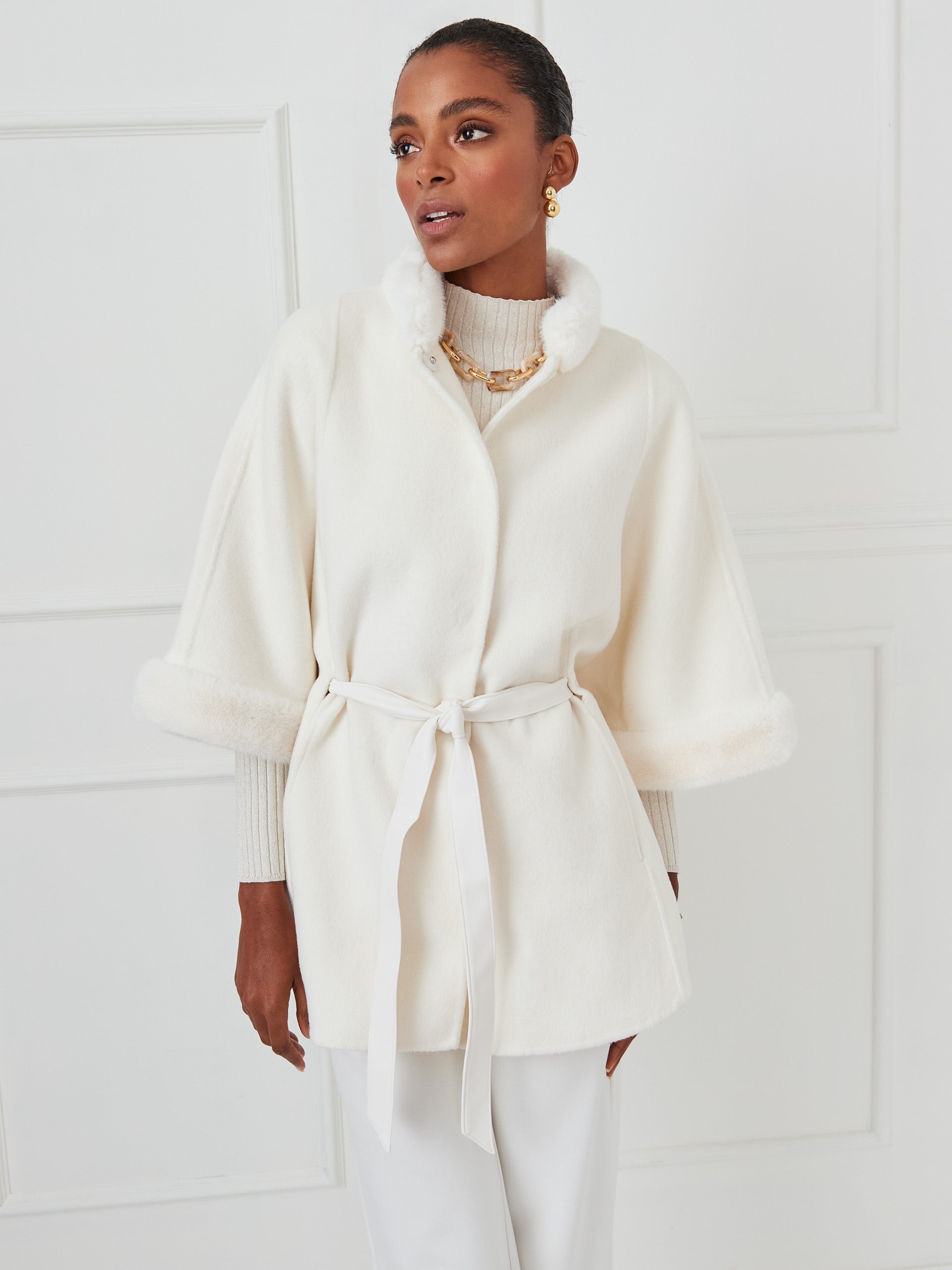 J.McLaughlin Davos poncho in cream made with faux fur/wool.