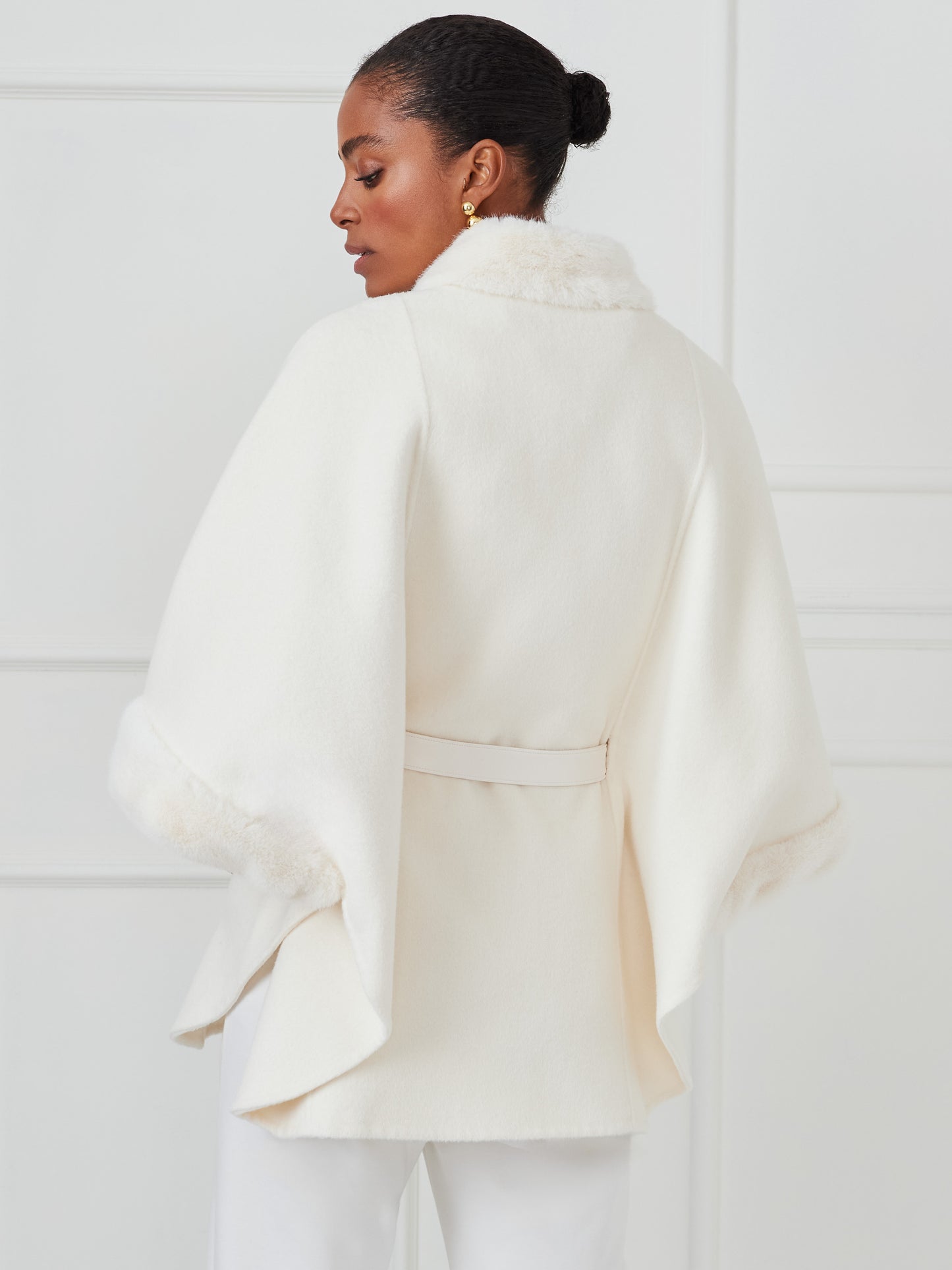 J.McLaughlin Davos poncho in cream made with faux fur/wool.