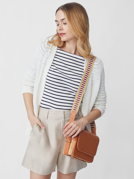 J.McLaughlin model wears Dawn Cardigan in White made with Linen and Cotton.