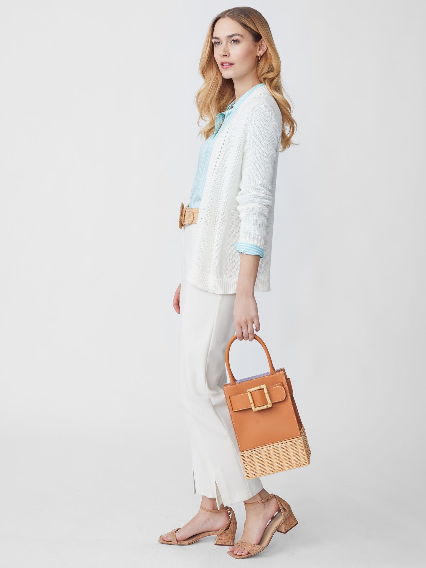 J.McLaughlin model wears Dawn Cardigan in White made with Linen and Cotton.