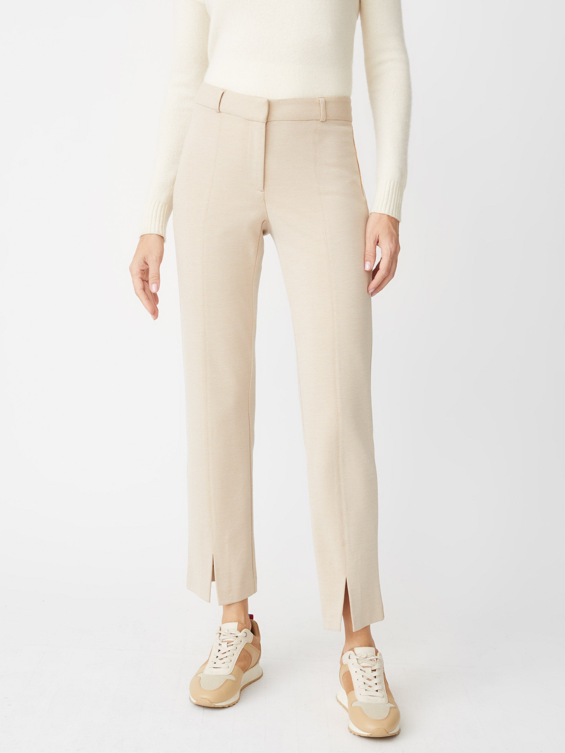 Model wearing J.McLaughlin Deanne pants in heather sand made with Bainbridge fabric.