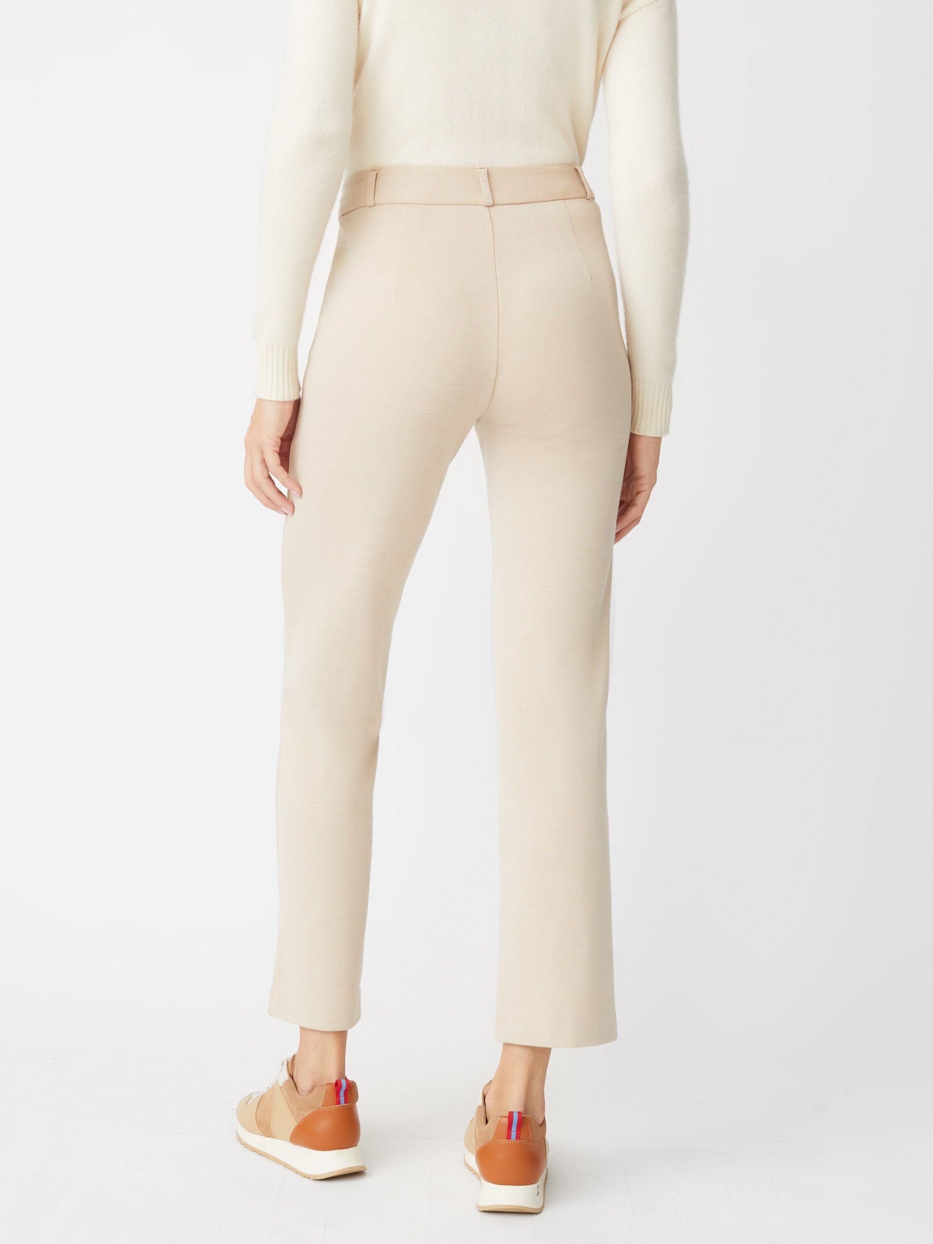 Model wearing J.McLaughlin Deanne pants in heather sand made with Bainbridge fabric.