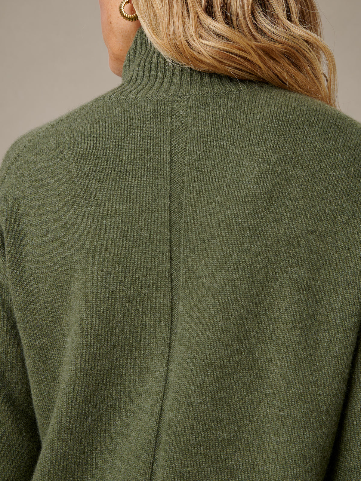 Dina Cashmere Turtleneck by J.McLaughlin shown from the back in olive green cashmere with a soft knit and ribbed neckline