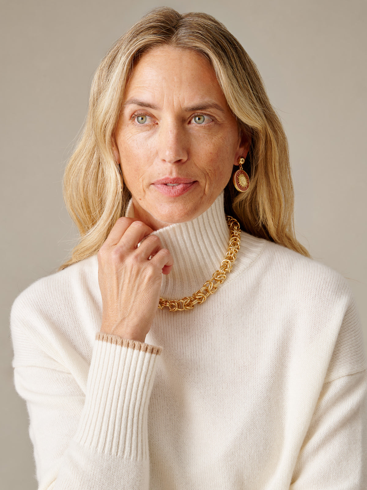 Dina Cashmere Turtleneck by J.McLaughlin in ivory cashmere with a classic ribbed collar and cuffs styled for timeless everyday elegance